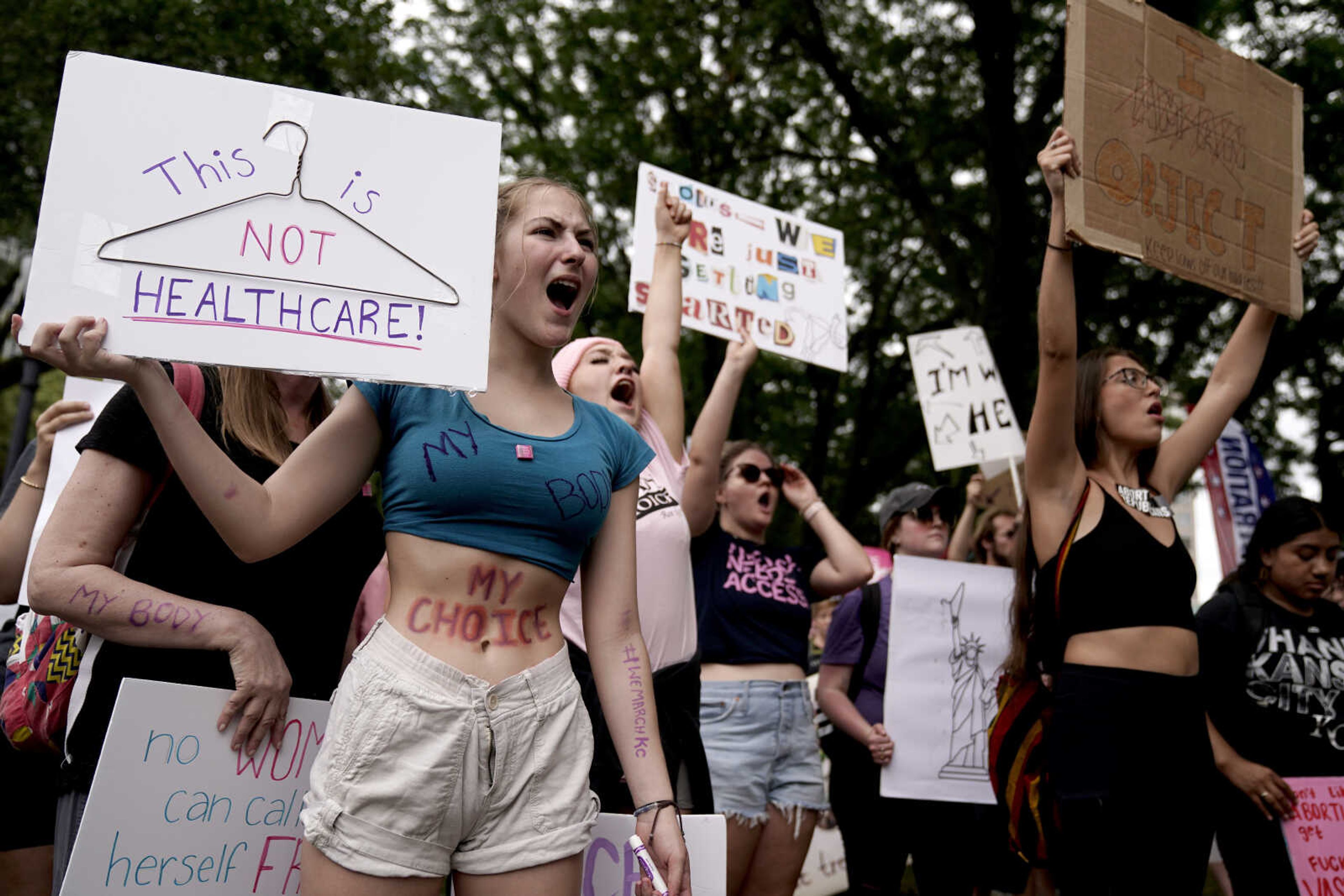 FILE - People rally in support of abortion rights, July 2, 2022, in Kansas City, Mo. A Missouri appeals court on Tuesday, Oct. 31, 2023, ruled against Republican-written summaries that described several abortion-rights amendments as allowing "dangerous and unregulated abortions until live birth." (AP Photo/Charlie Riedel, File)