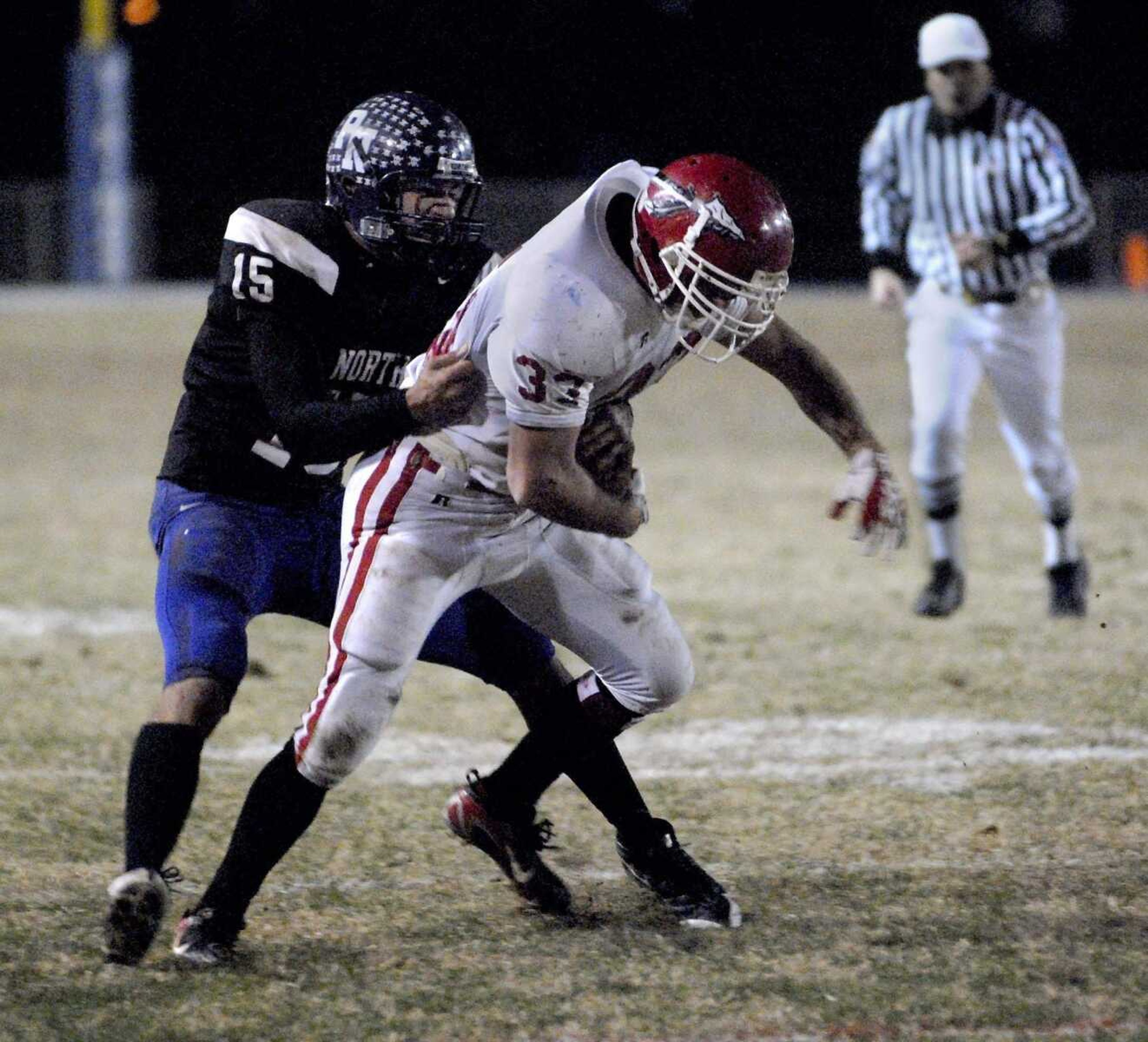 FRED LYNCH ~ flynch@semissourian.com<br>Parkway North's Tylor Brock tackles Jackson's Drew Bucher during their playoff game in November. Brock signed to play at Southeast Missouri State in the fall.