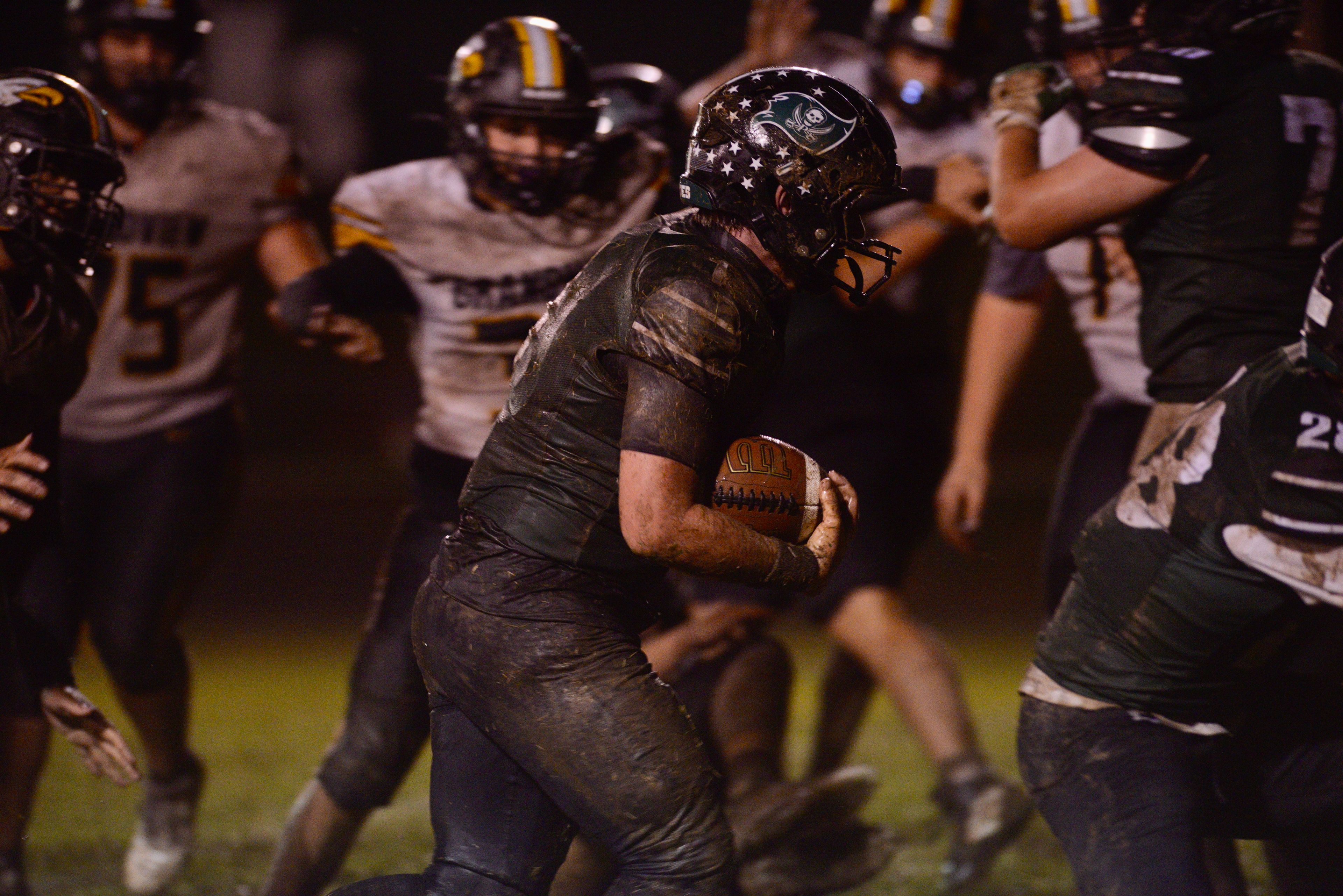 Perryville running back Barrett Wheeler runs through Grandview defenders on Friday, Sept. 26, in Perryville, Mo.