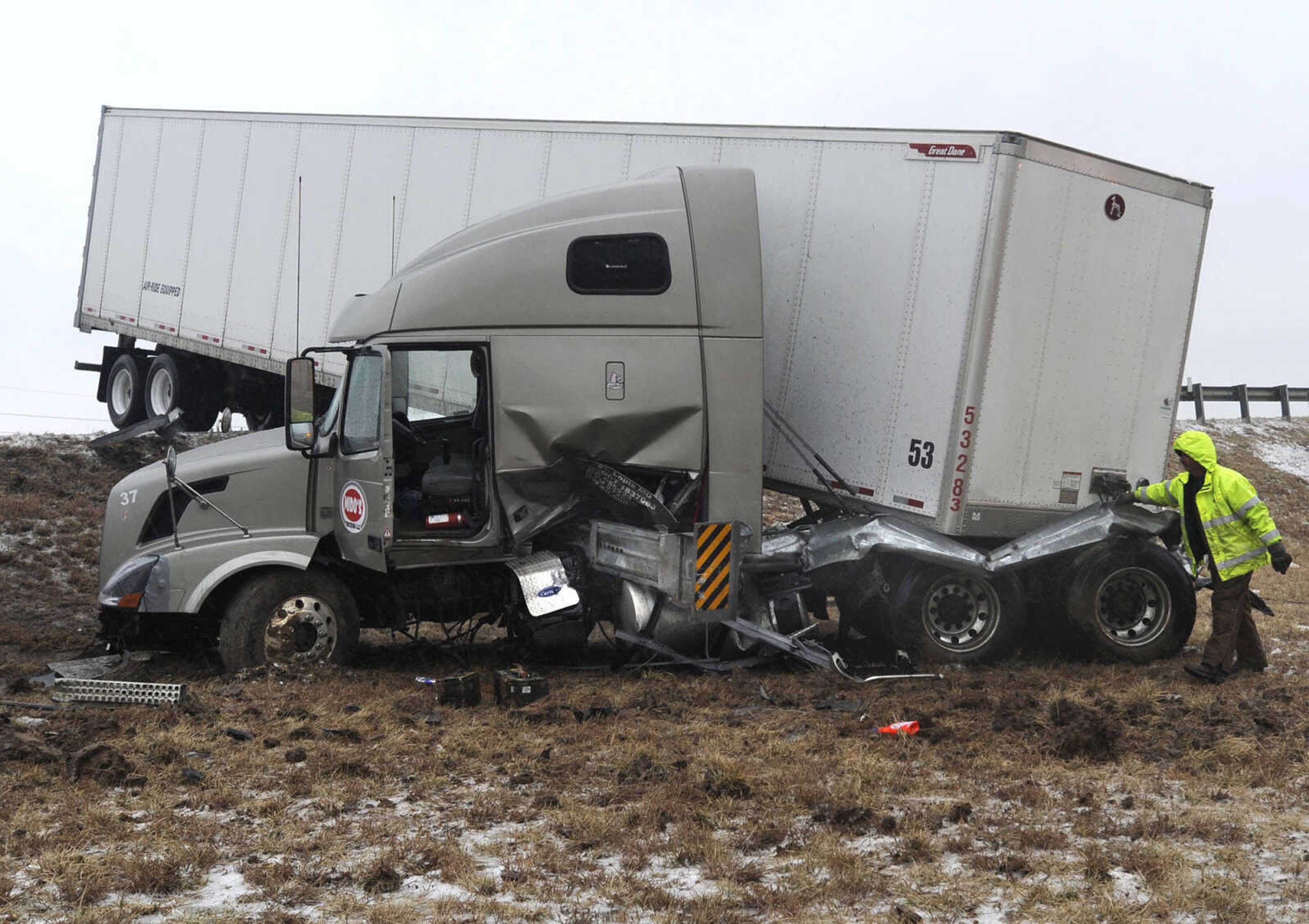 FRED LYNCH ~ flynch@semissourian.com
A tractor-trailer that slid off the southbound lanes of Interstate 55 came to rest near the off-ramp of Center Junction near mile marker 100 on Tuesday, Feb. 4, 2014. The wreck took out a portion of the guard rail.