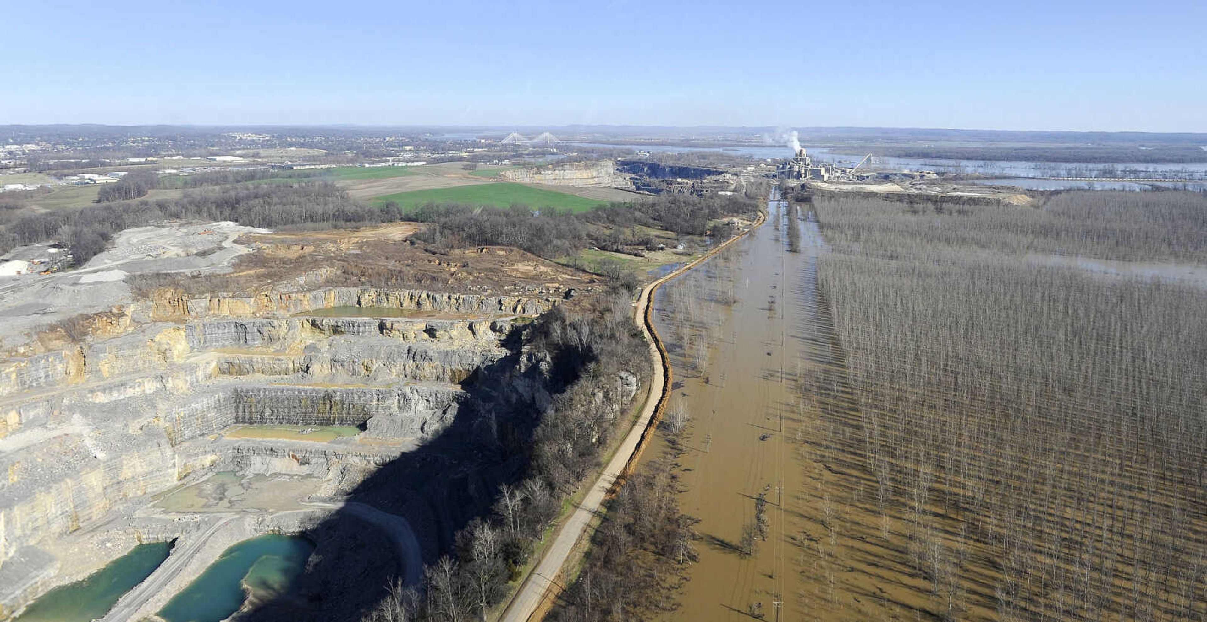 LAURA SIMON ~ lsimon@semissourian.com

Floodwater near Buzzi Unicem on South Sprigg Street is seen, Saturday, Jan. 2, 2016.