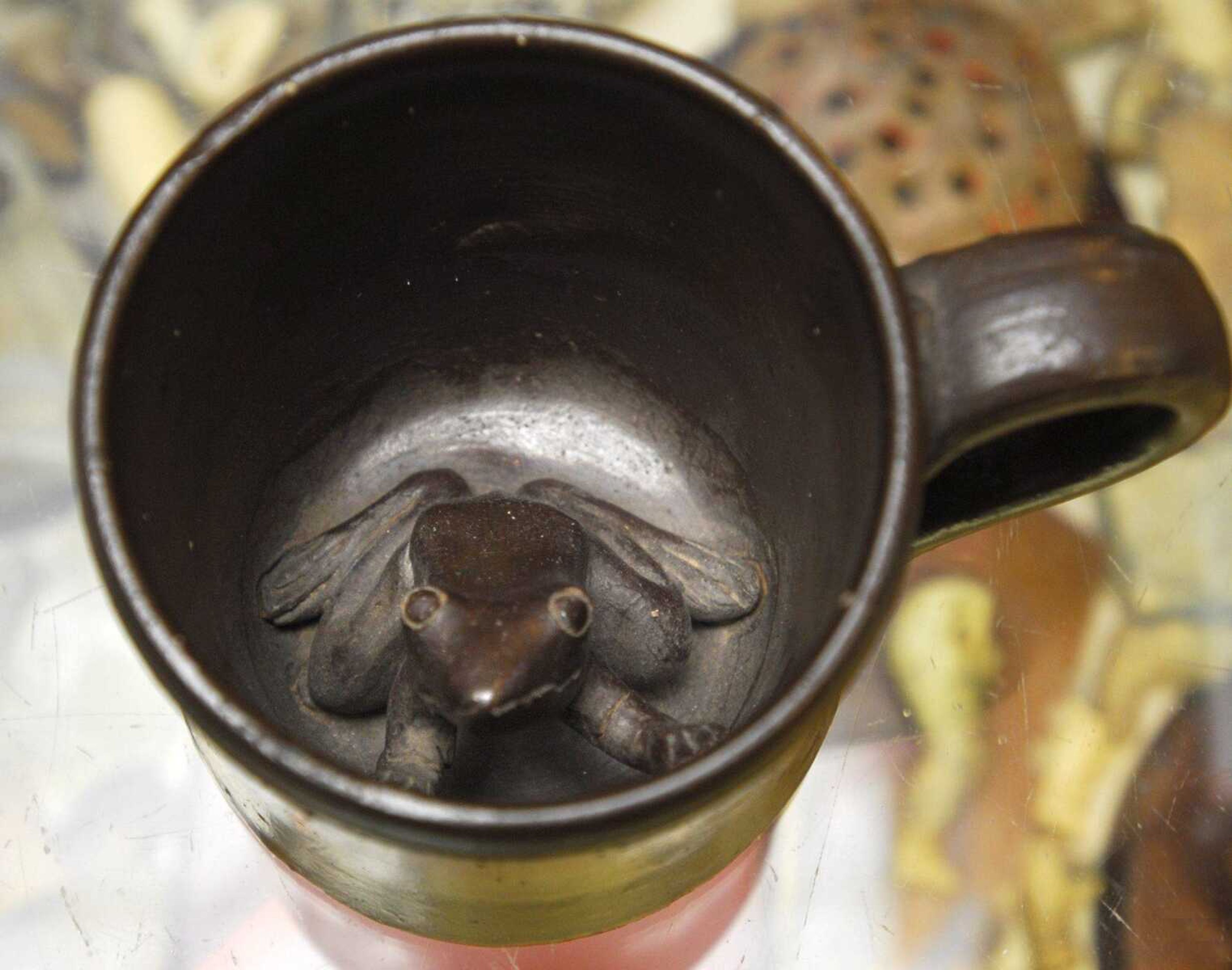 This Anna Pottery frog mug is part of the Anna Kirkpatrick Pottery Museum inside Isom's Antiques and Collectibles in Anna, Ill.