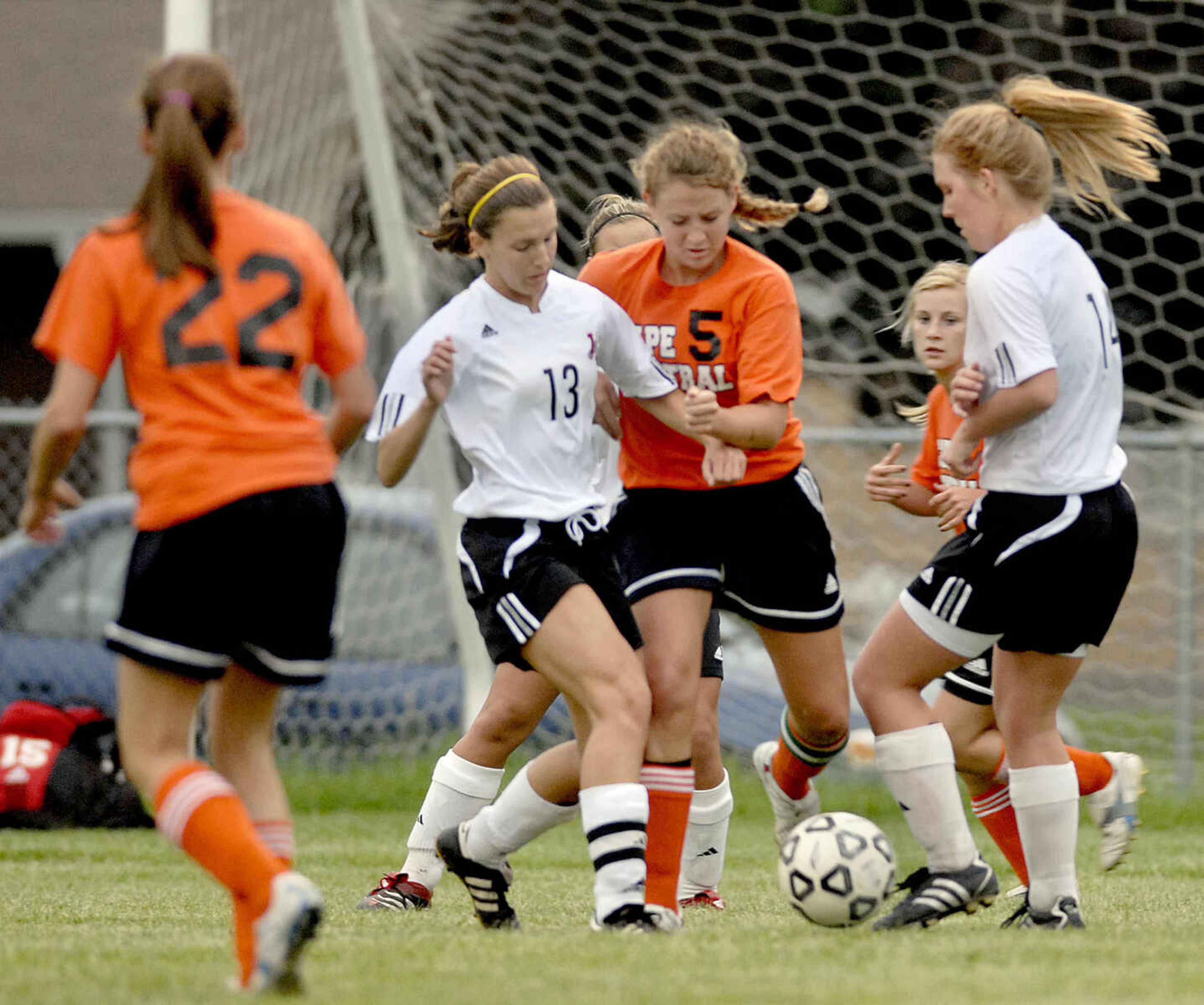 ELIZABETH DODD ~ edodd@semissourian.com
Jackson's Megan Davidson, left, and Central's Sarah Uptmor fight for the ball.