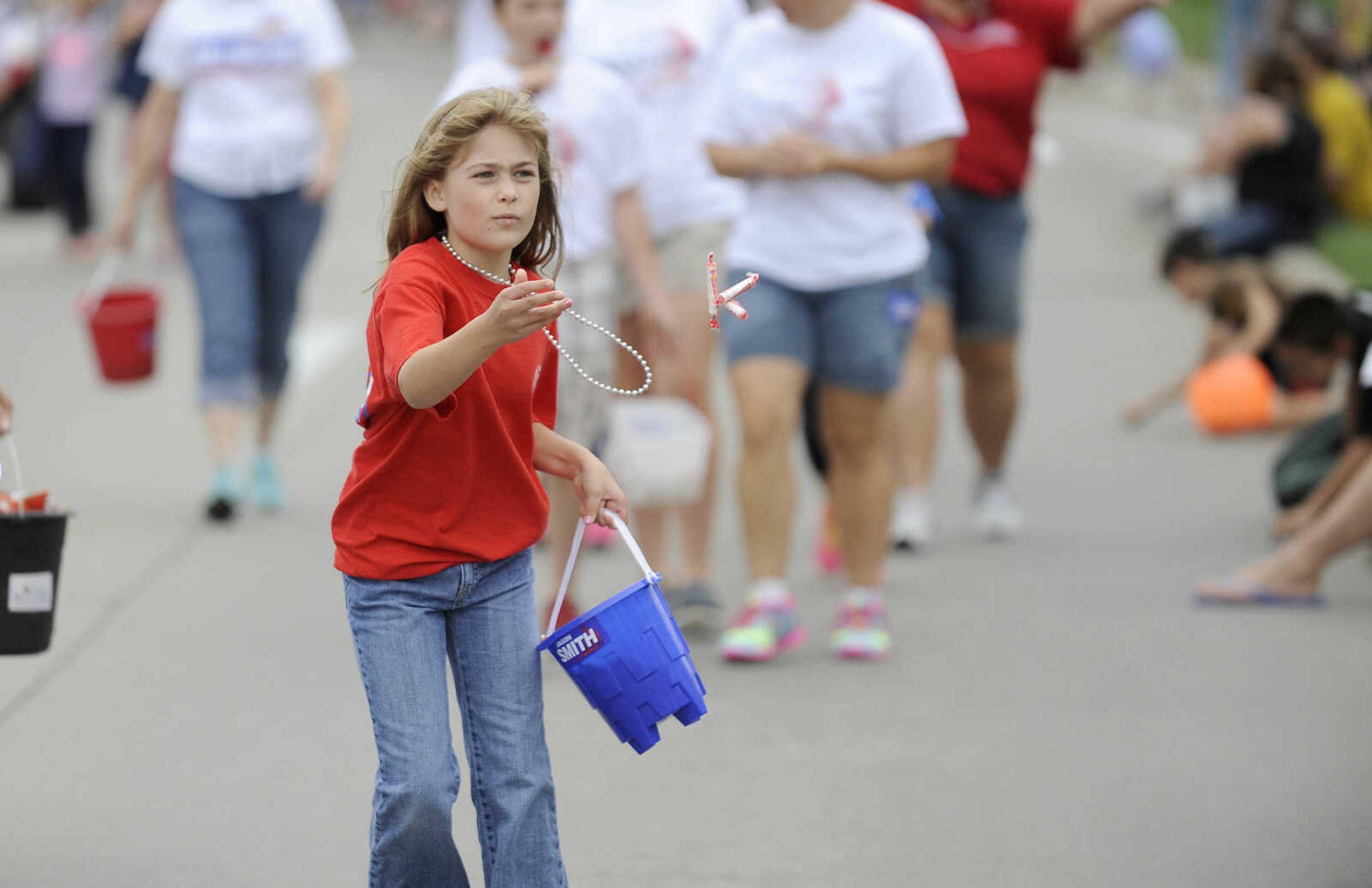 GLENN LANDBERG ~ glandberg@semissourian.com

The SEMO District Fair Parade heads down Broadway after starting in Capaha Park Saturday morning, Sept. 6, 2014, in Cape Girardeau. The parade ended at Arena Park where the 159th annual SEMO District Fair is being held.