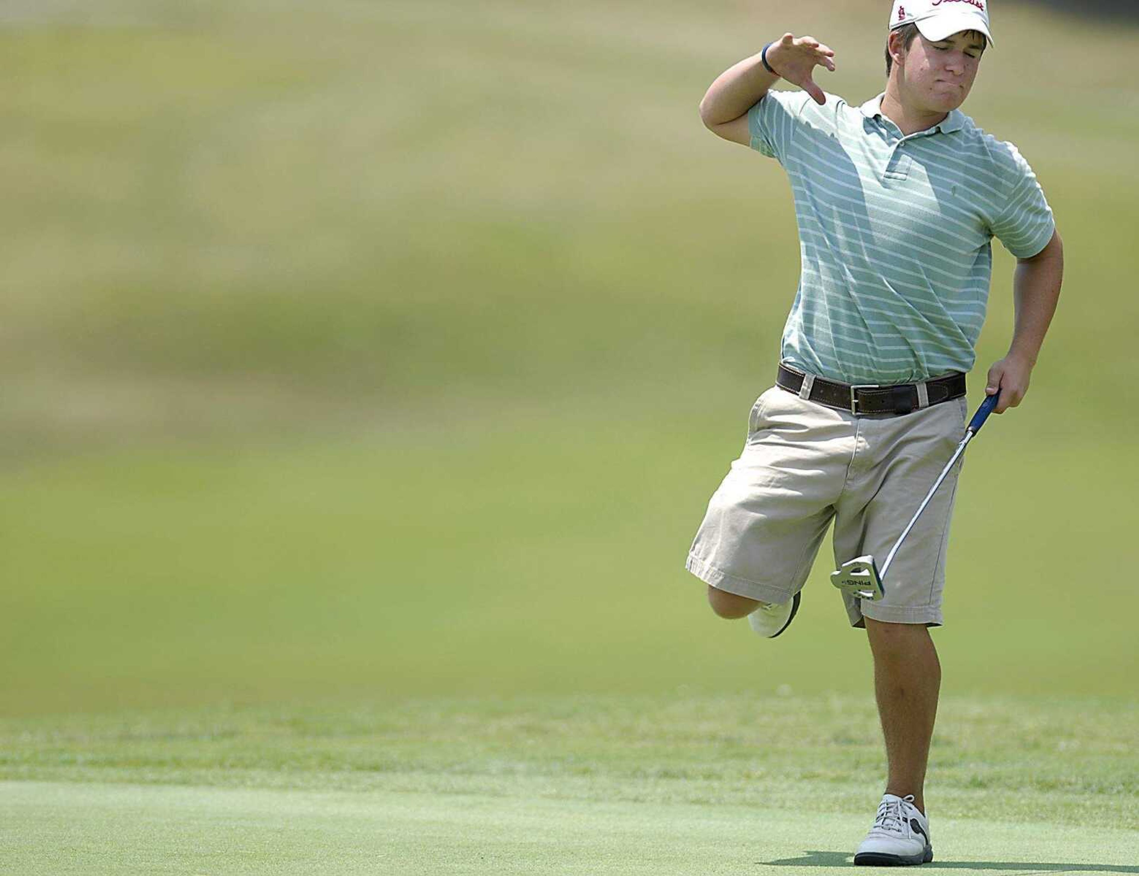 KIT DOYLE ~ kdoyle@semissourian.com
Tyler Arpin, 14, held up mid-celebration as his birdie putt failed to drop on the second hole Wednesday, June 25, 2008, during the PGA Gateway Junior Series tournament at Bent Creek in Jackson.