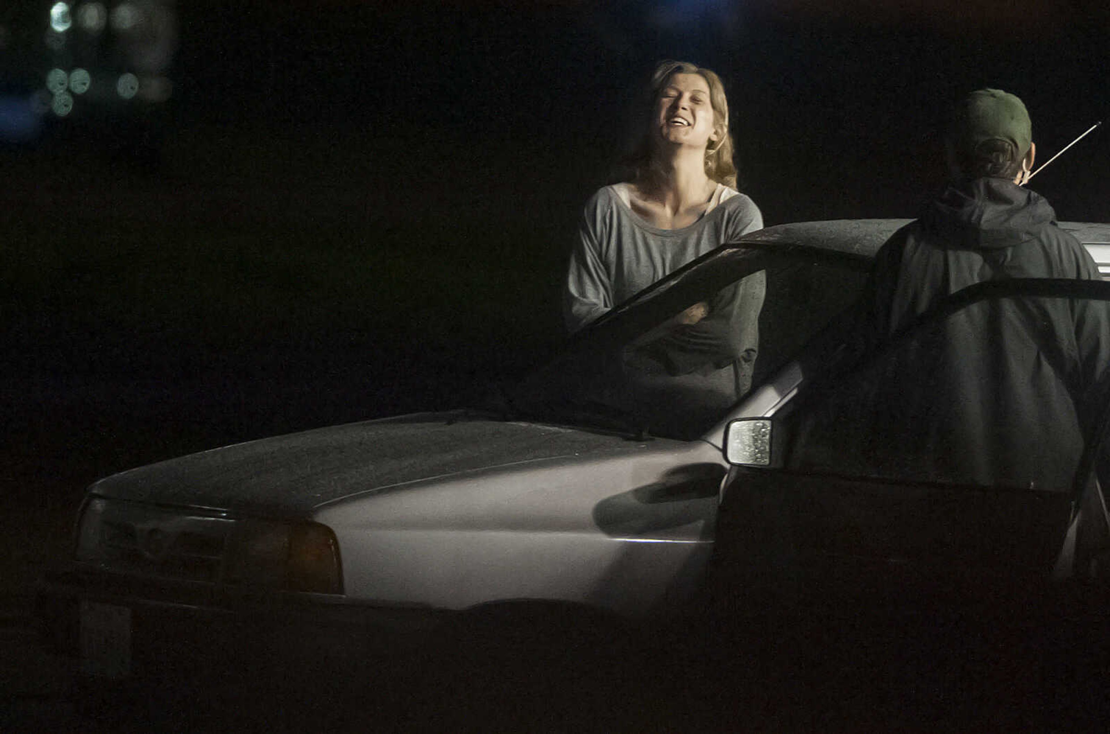 ADAM VOGLER ~ avogler@semissourian.com
An actress believed to be Rosamund Pike between takes on the set of "Gone Girl," Friday, Sept. 20, at the Rhodes 101at 546 S. Sprigg St. in Cape Girardeau. Pike plays Amy Dunne in the film which is based on a novel of the same name by Gillian Flynn.