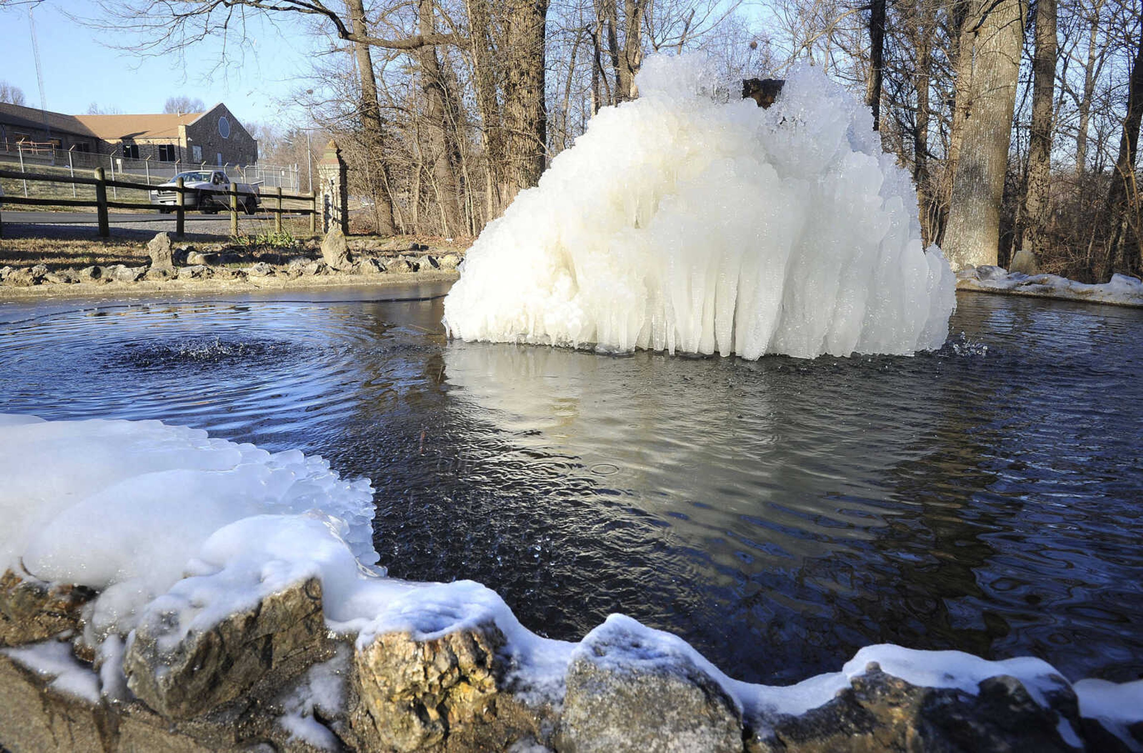 FRED LYNCH ~ flynch@semissourian.com
Cold temperatures support a growing ice sculpture Thursday, Jan. 4, 2018 on the fountain at the goldfish pond at Fountain Park in Cape Girardeau. Situated across from the city's water plant on East Cape Rock Drive, the park was built in 1931 as a project of the Better Service Club of Missouri Utilities Co. employees.