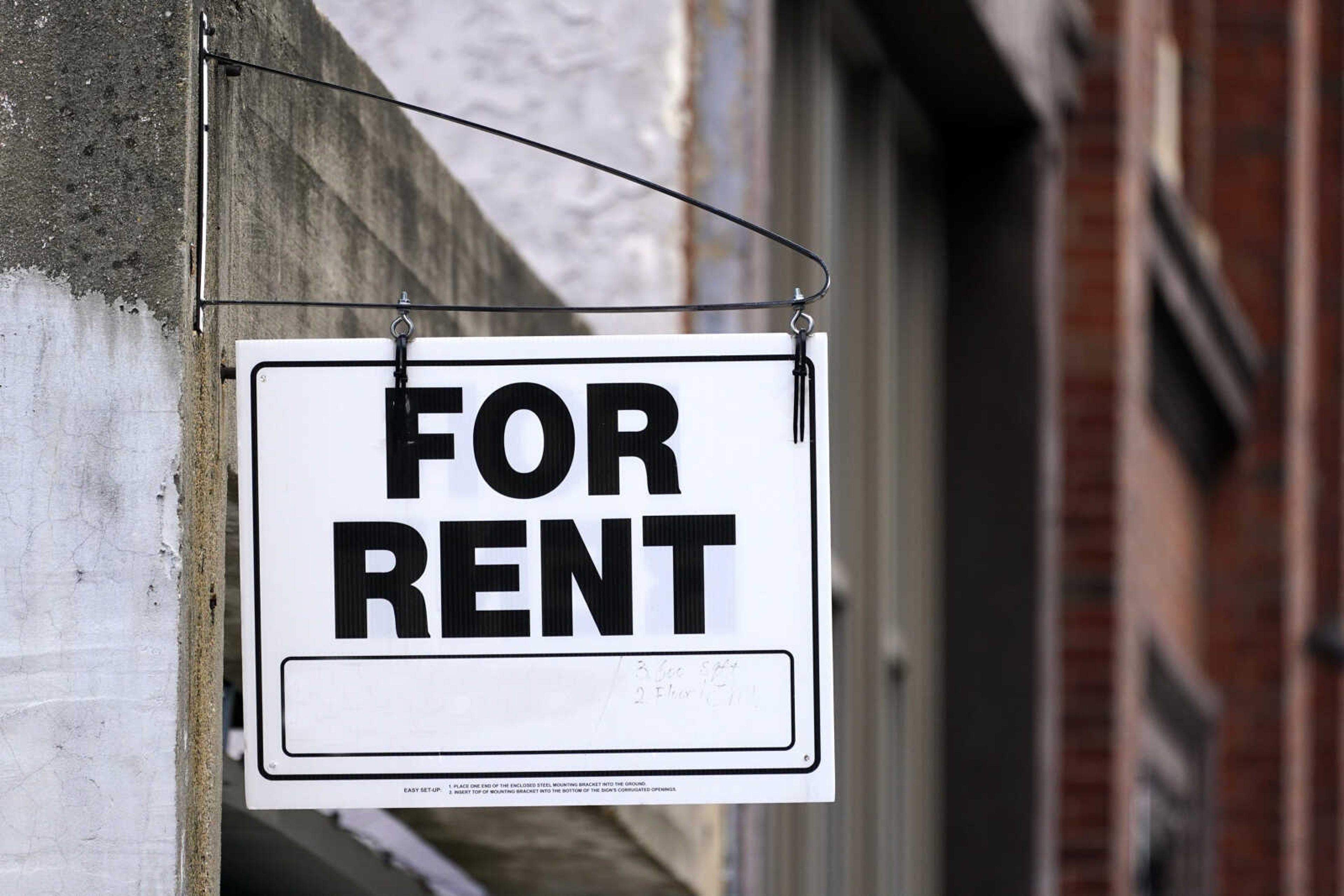 A "For Rent" sign is posted on a building Jan. 18 in Philadelphia. The federal rental assistance is running out in some places, which is putting pressure on the U.S. Treasury Department to shift remaining funds to the states and cities most in need. Treasury has shifted more than $2 billion mostly to states and cities with a higher concentration of renters and away from small, mostly rural states.