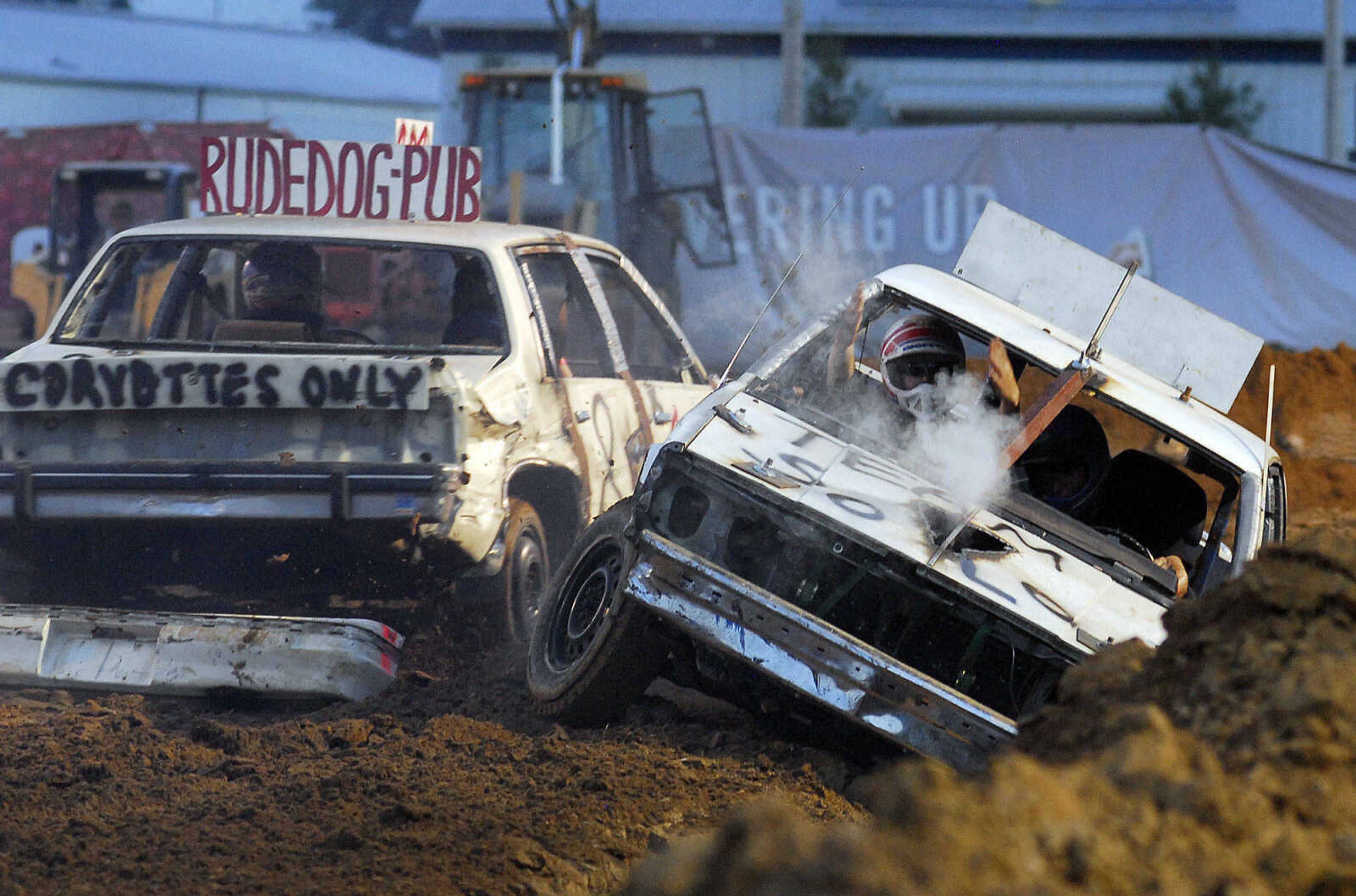 LAURA SIMON~lsimon@semissourian.com
A side collision at Dual Demolition Derby during the U.S.A. Veterans Fourth of July celebration at Arena Park in Cape Girardeau Sunday, July 4, 2010.