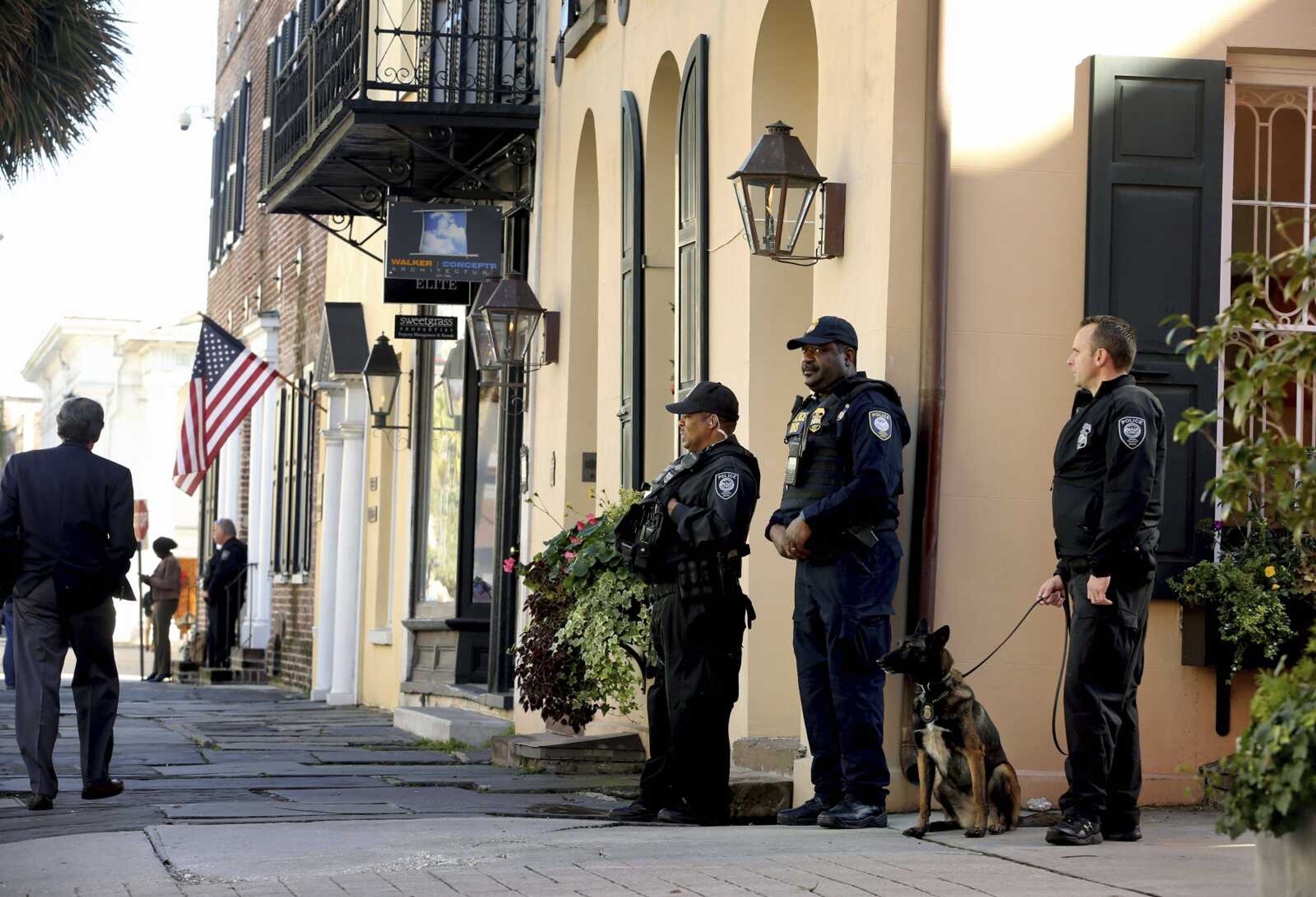 Homeland Security officers patrol the streets outside the federal courthouse Wednesday in Charleston, South Carolina, during  Dylann Roof's trial.