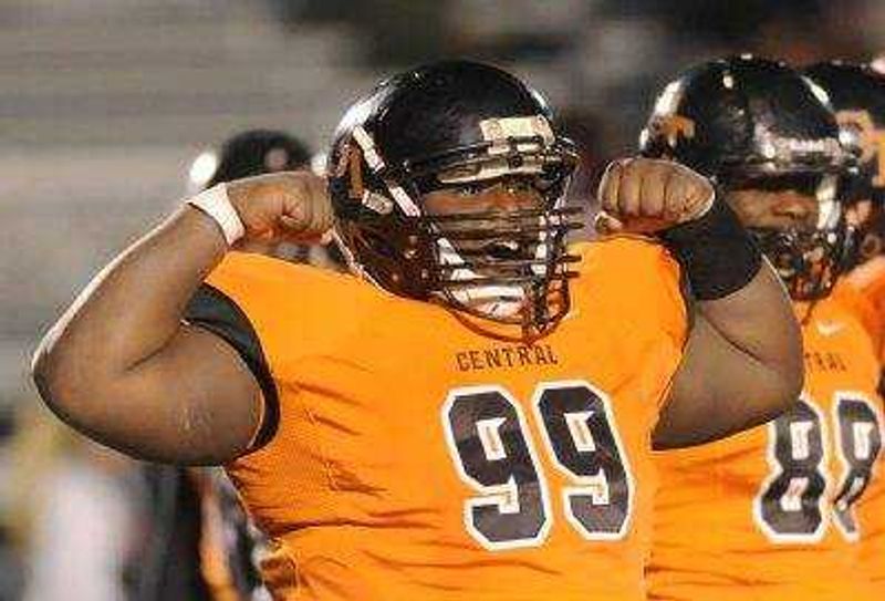 Central's Lamarcus Johnson flexes for the crowd in the fourth quarter against Sikeston during the Class 4 District 1 semifinals Friday, Oct. 31, 2014 at Central. (Glenn Landberg)