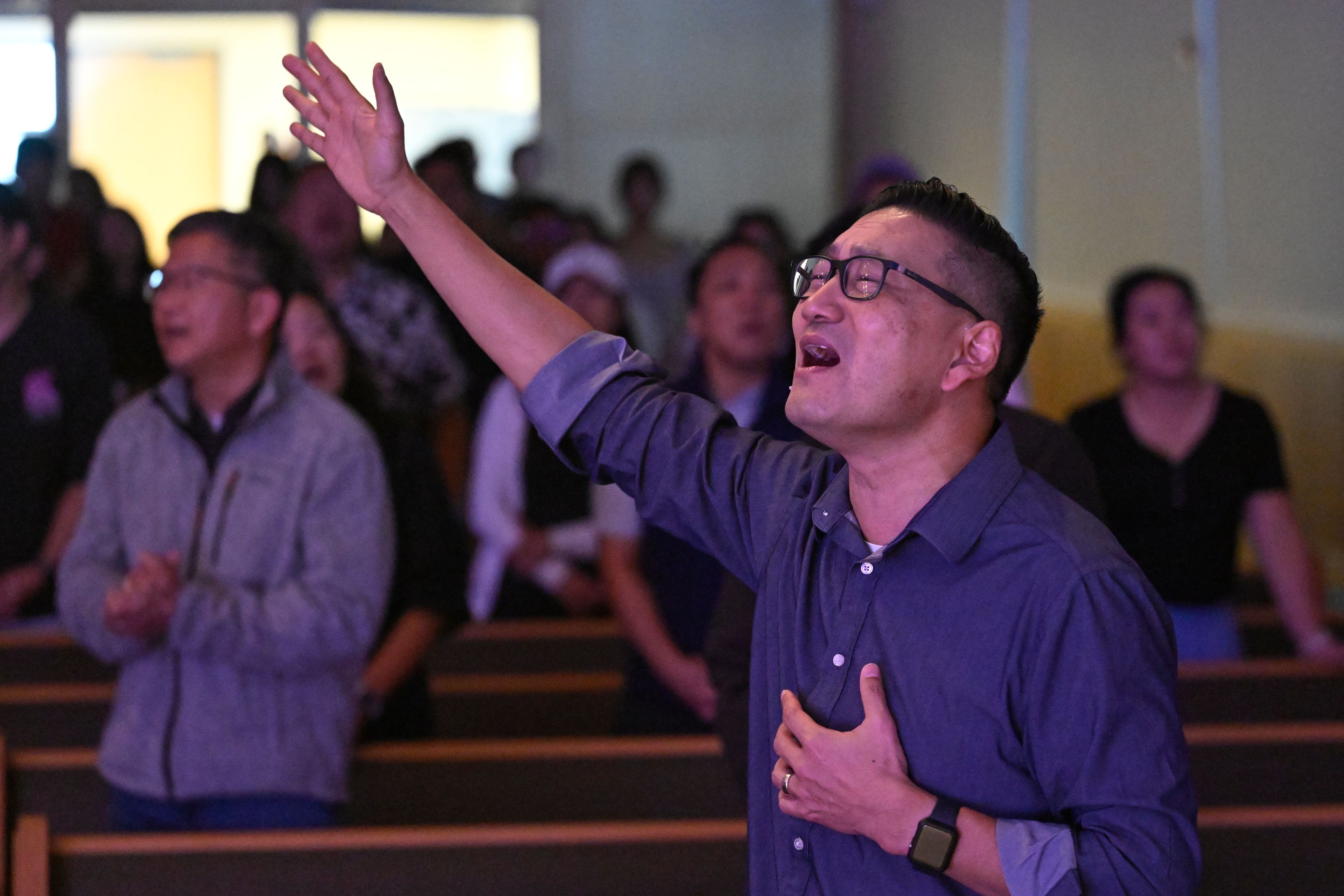 Pastor Owen Lee sings during a service at the Christ Central Presbyterian Church, Sunday, Oct. 13, 2024 in Centreville. (AP Photo/John McDonnell)