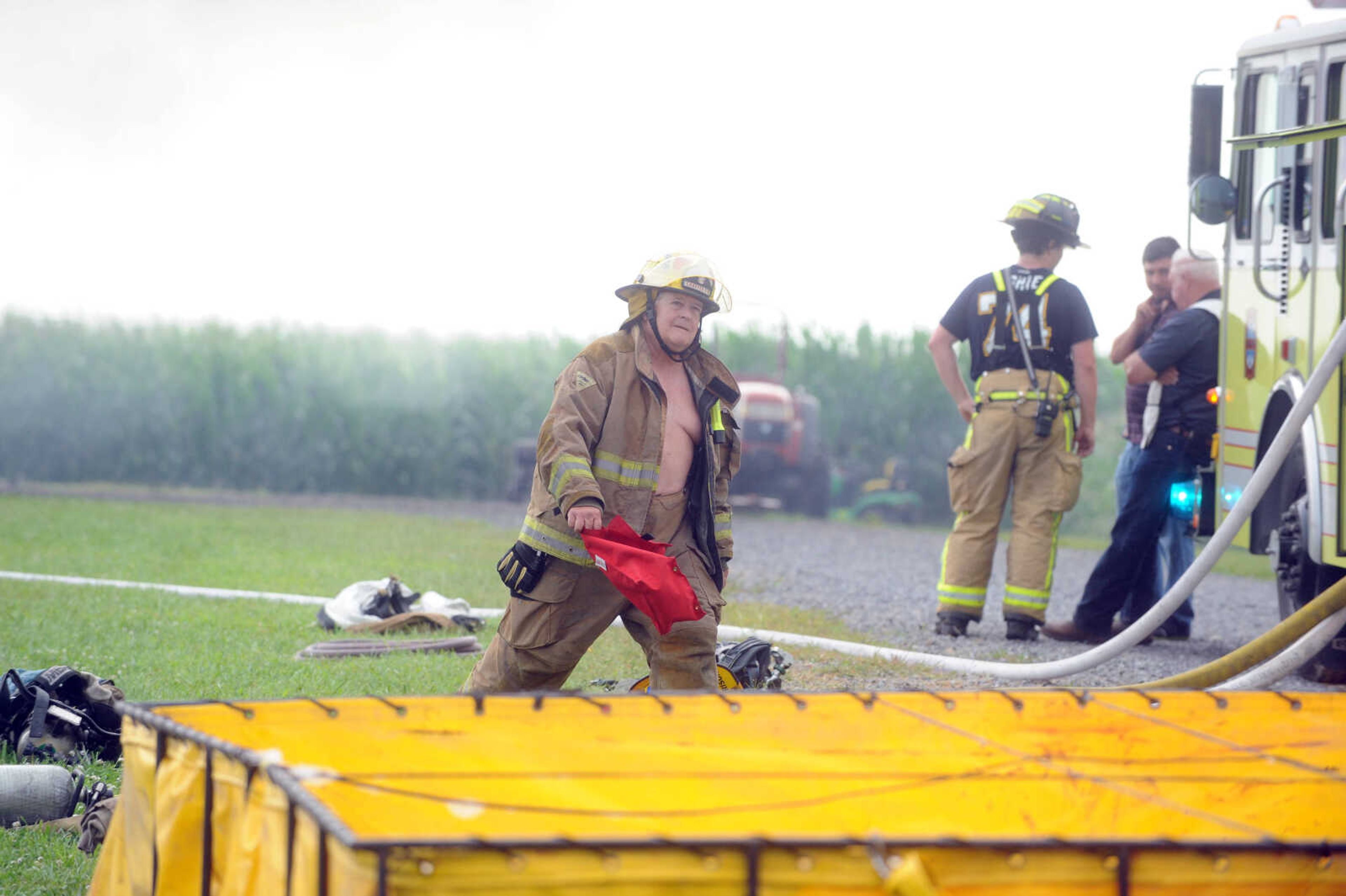 LAURA SIMON ~ lsimon@semissourian.com

Firefighters from Delta, Scott City, Chaffee and New Hamburg/Benton/Commerce battle a house fire off County Road 204 in Scott County Wednesday afternoon, July 23, 2014.