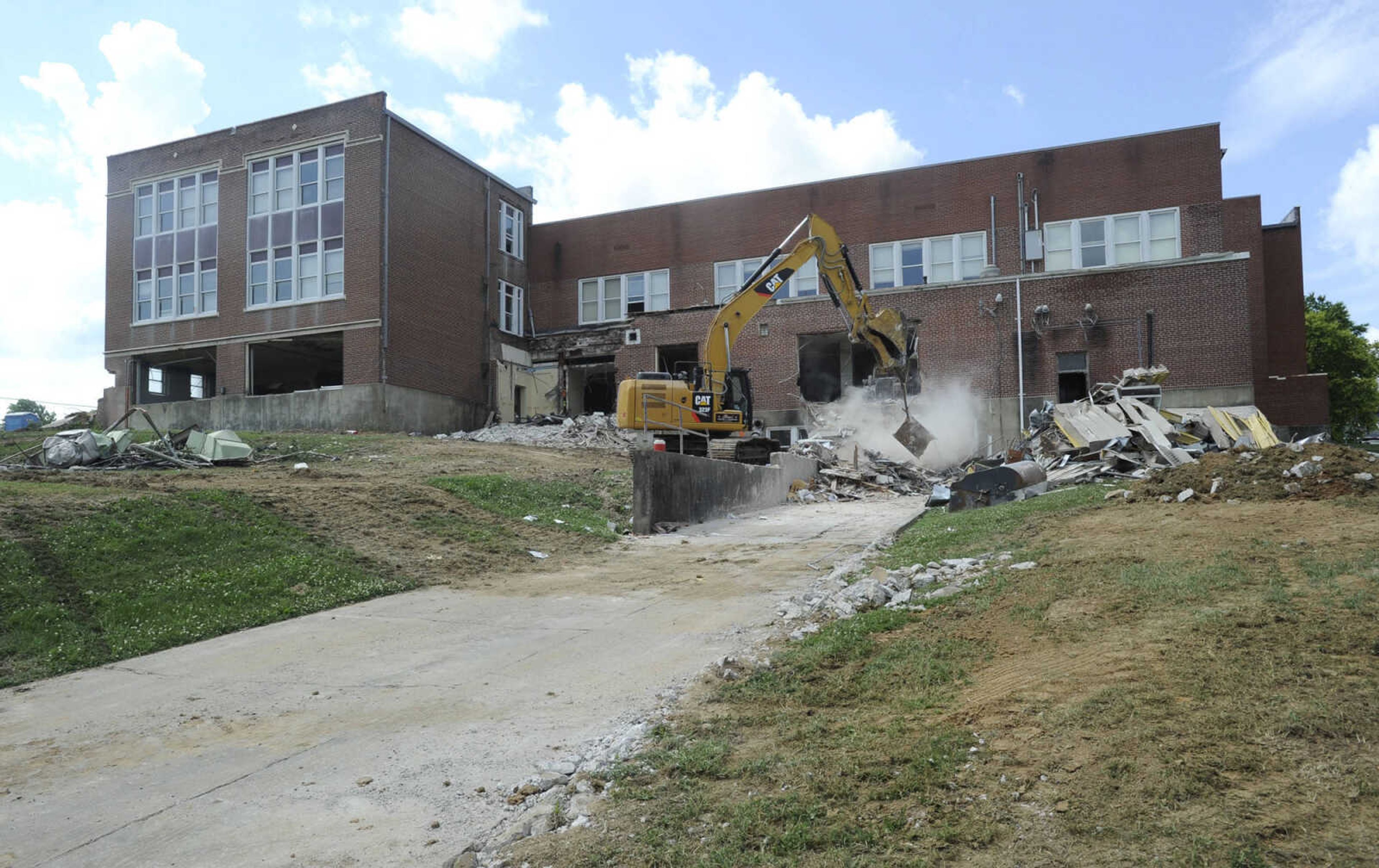 FRED LYNCH ~ flynch@semissourian.com
Demolition of the "Old A" high-school building is underway Wednesday, June 14, 2017 at Jackson High School in Jackson.