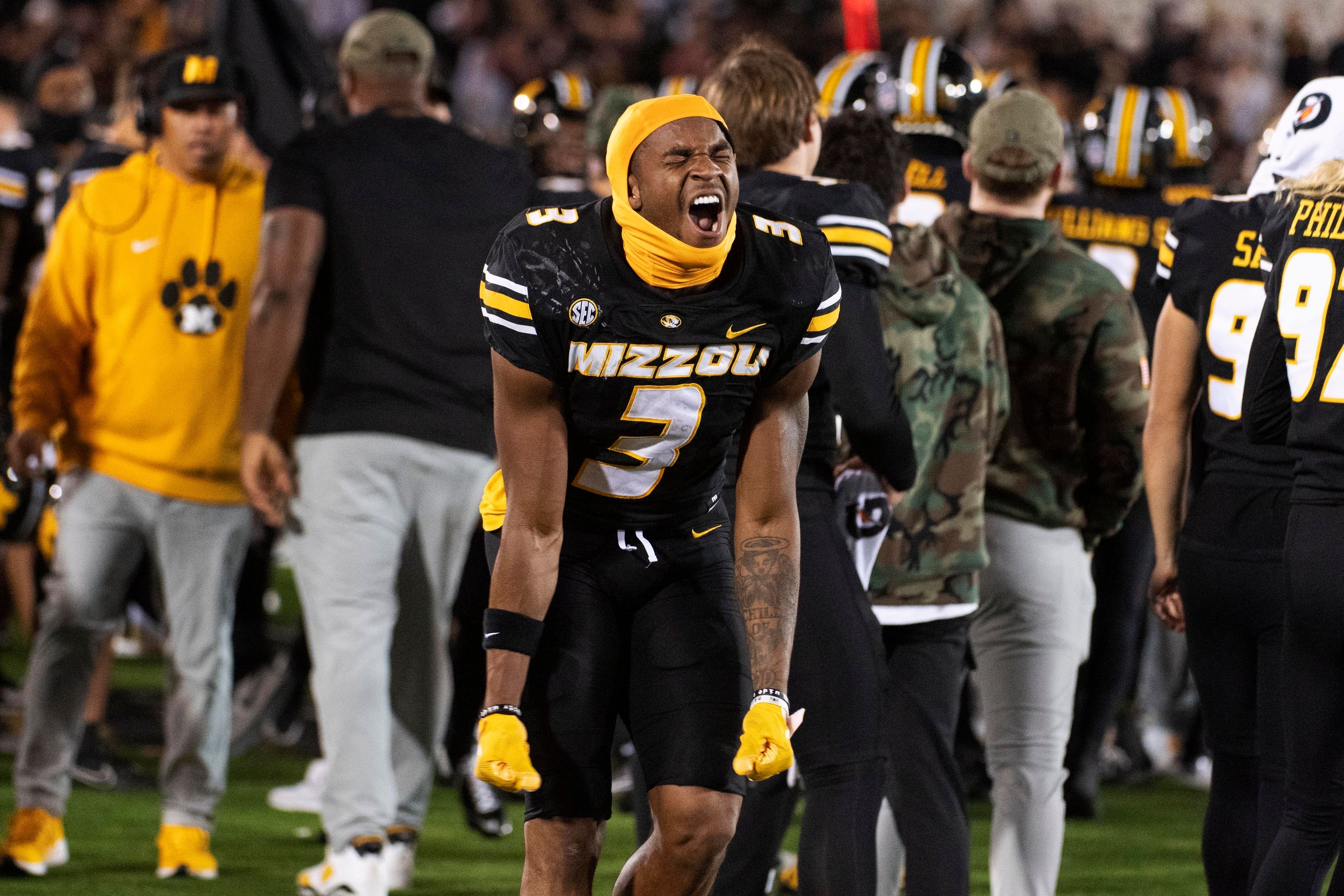 Missouri wide receiver Luther Burden III celebrates on the sidelines during an NCAA college football game against Oklahoma Saturday, Nov. 9, 2024, in Columbia, Mo. Missouri won 30-23. (AP Photo/L.G. Patterson)