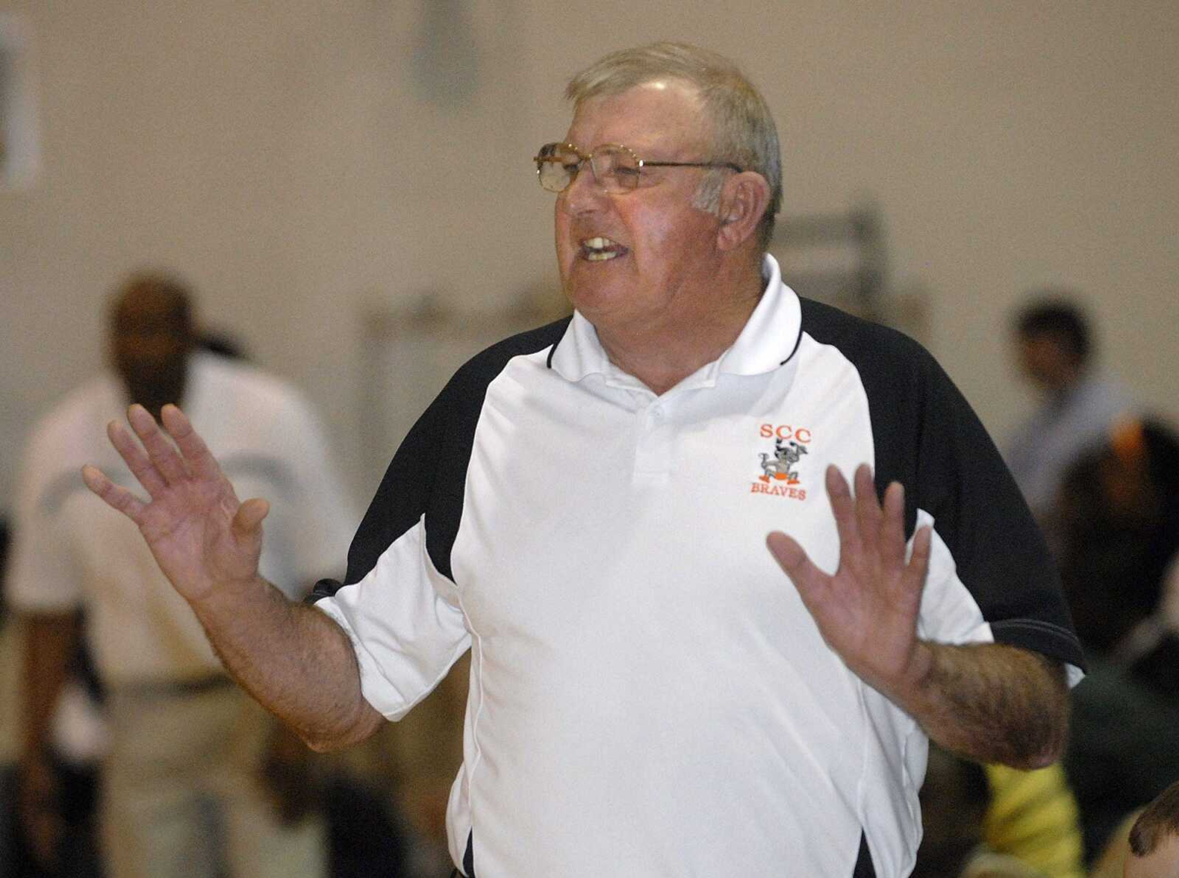 Scott County Central coach Ronnie Cookson talks to his players during the game with New Madrid County Central.