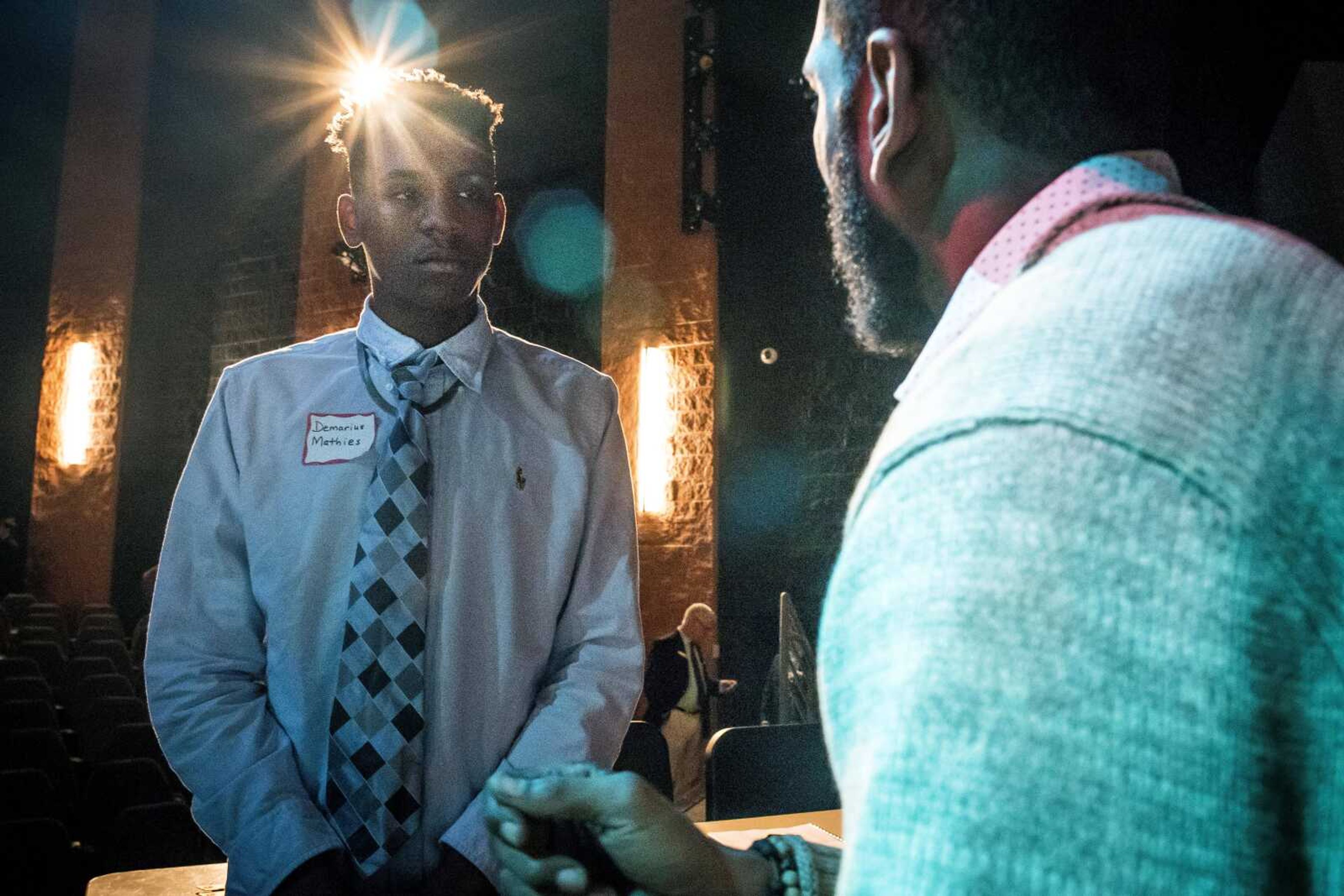 Honorable Young Men Club member Demarius Mathies, left, talks about NASA, basketball and billionaires' diversification strategies with Representative Wiley Price during a visit from regional politicians and members of the Missouri state legislature's black caucus Friday, Oct. 25, 2019, at Cape Central High School.