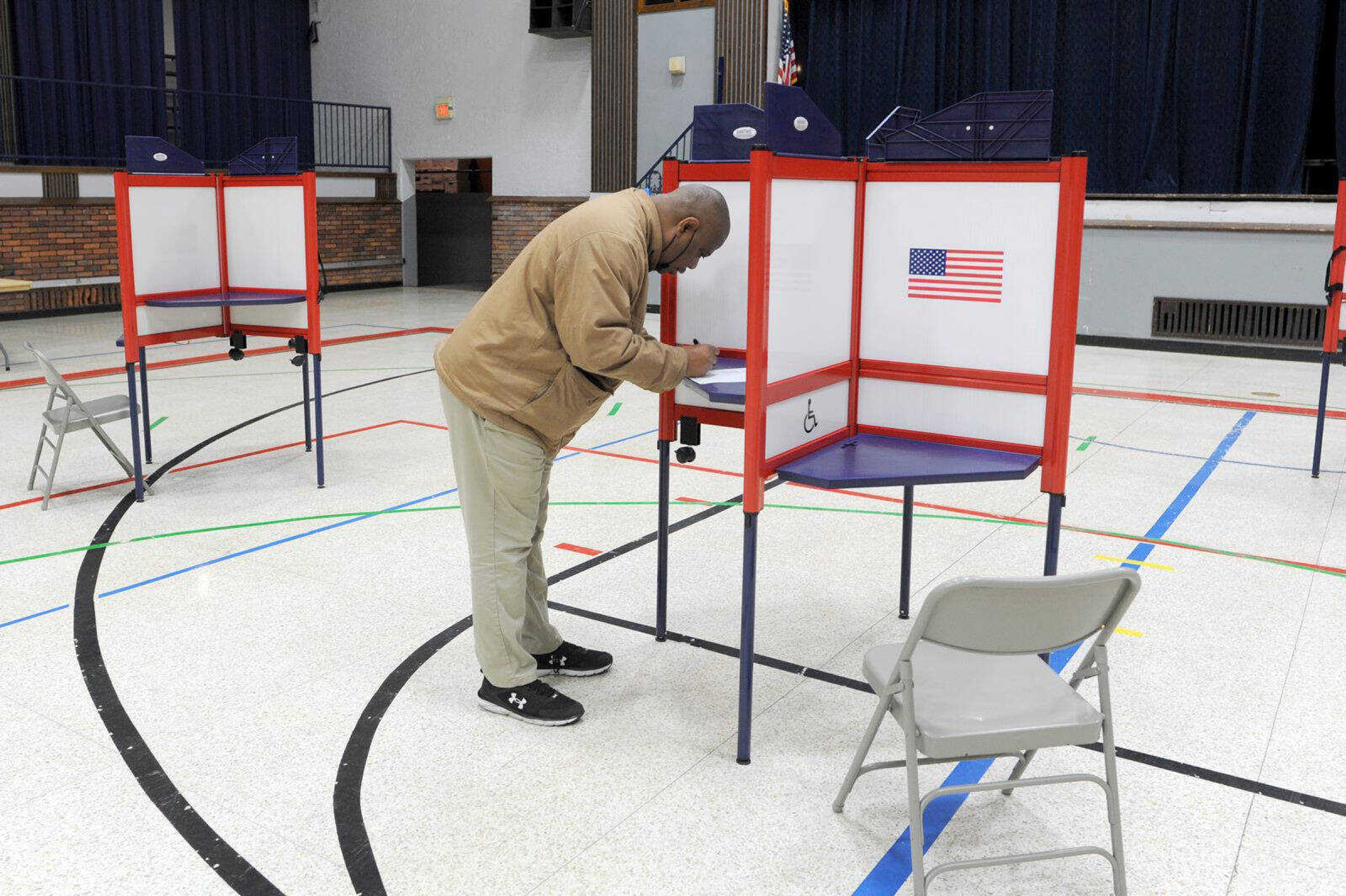 Michael Bankhead votes in Tuesday's election at the Arena Building in Cape Girardeau.