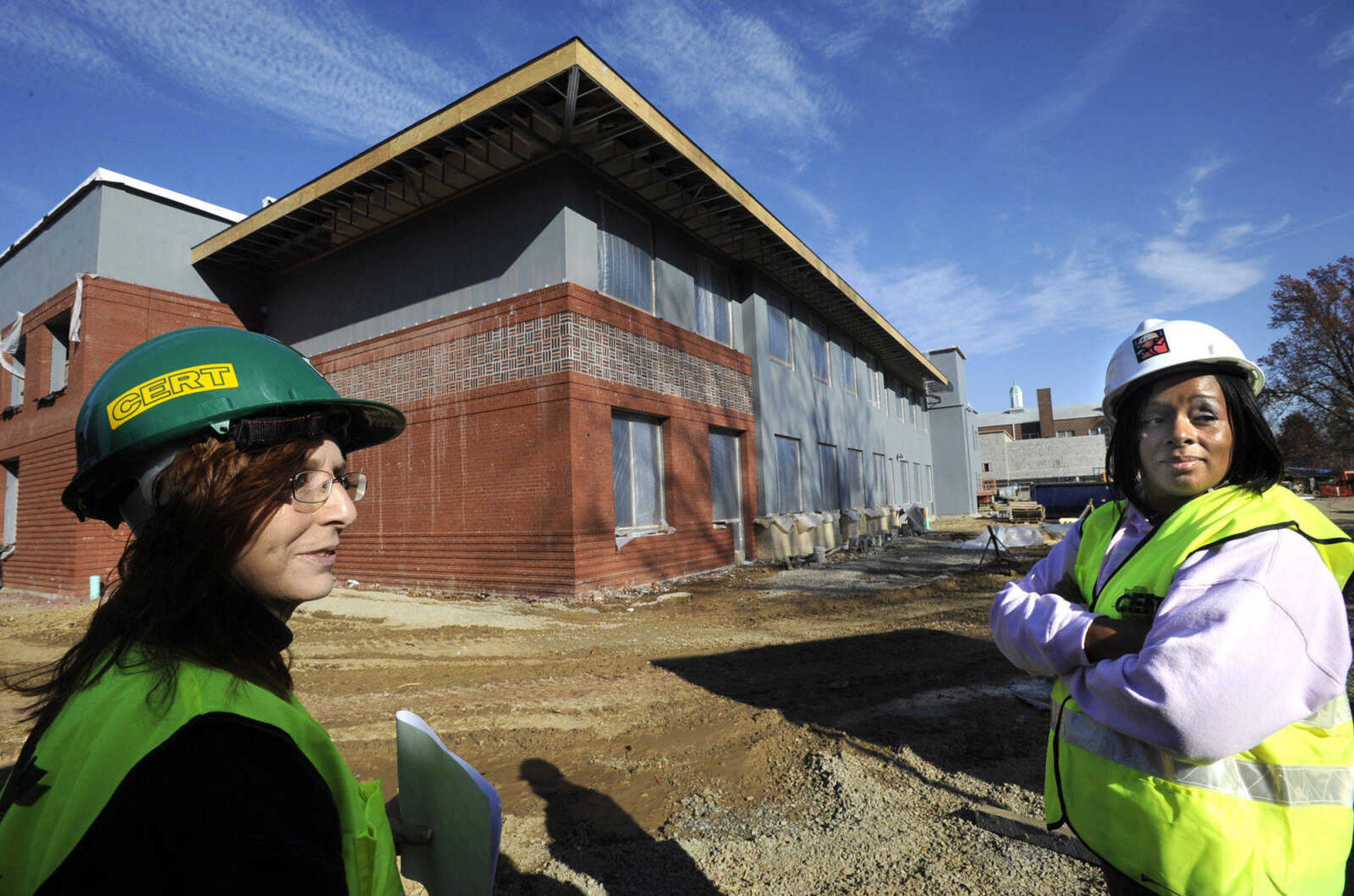 FRED LYNCH ~ flynch@semissourian.com
Franklin Elementary School principal Dr. Rhonda Dunham, left, and administrative assistant Tina Wright stand on the new school construction site behind the old school building Friday, Nov. 11, 2011.