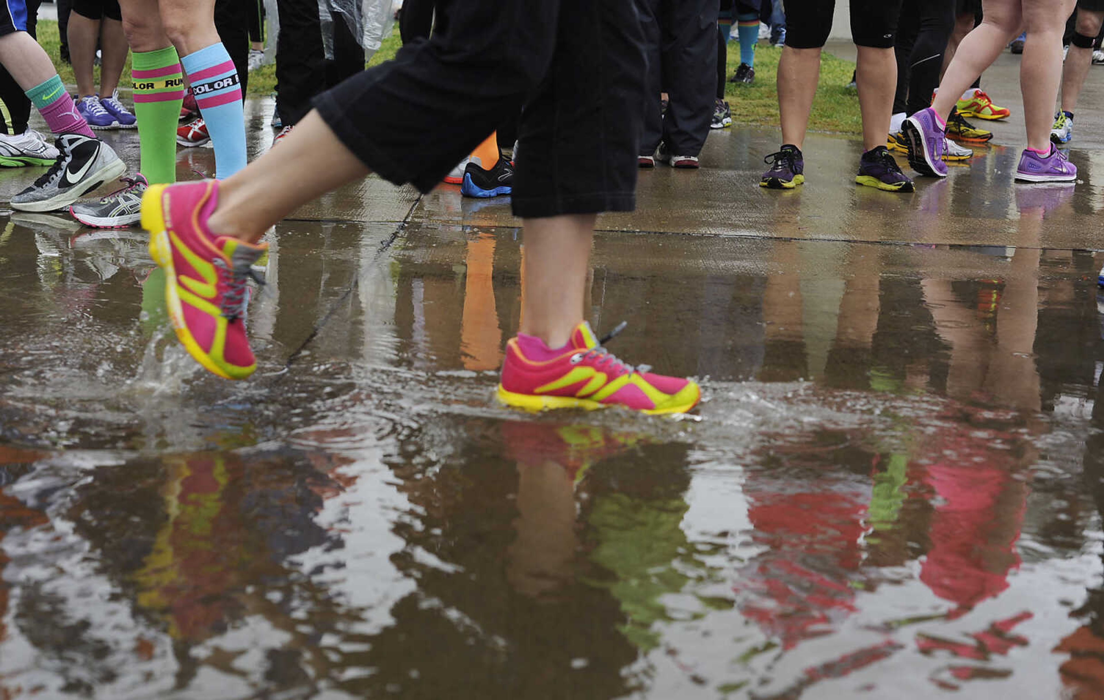 Runners wait at the starting line of the 2013 Cupcake Challenge Sunday, May 5, at Arena Park in Cape Girardeau. Runners could have time deducted from their finish time for every cupcake they ate during the the 5k race, there was also a 1-mile kids race, which is a fundraiser for Hope Children's Home.