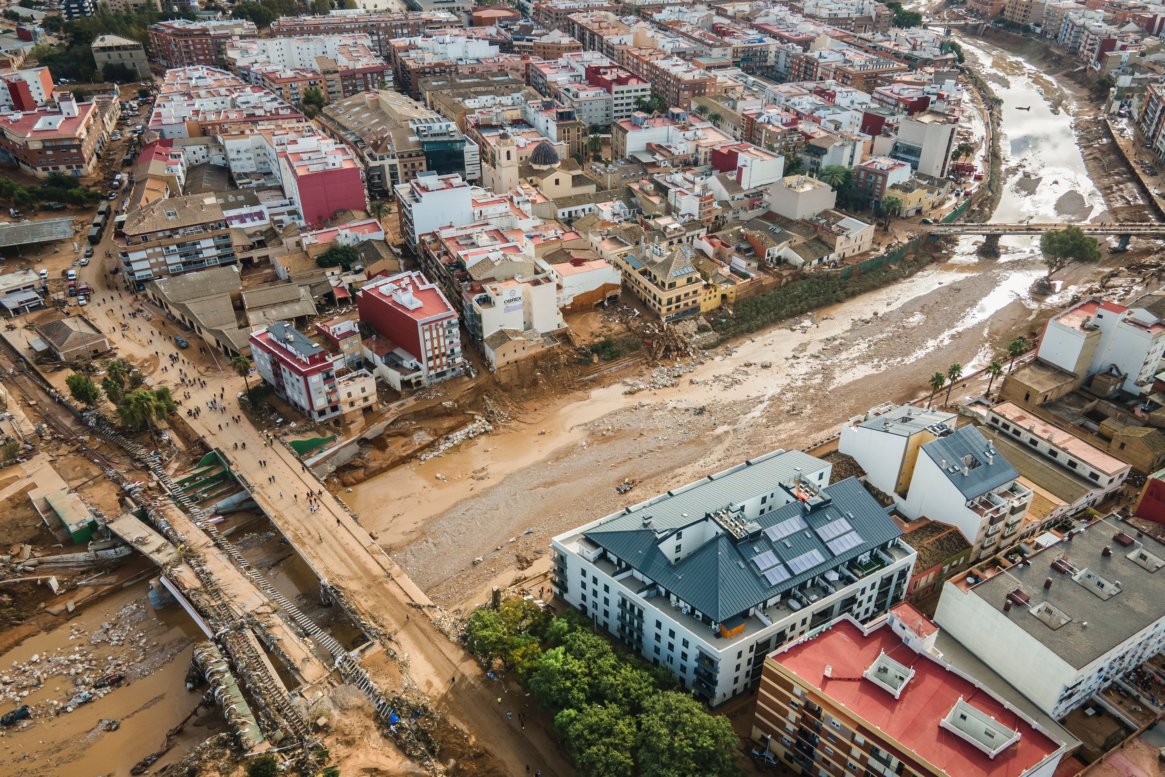 Mud covers the area in the aftermath of last Tuesday and early Wednesday storm that left hundreds dead or missing in the region, in Paiporta, outskirts of Valencia, Spain, Saturday, Nov. 2, 2024.(AP Photo/Angel Garcia)