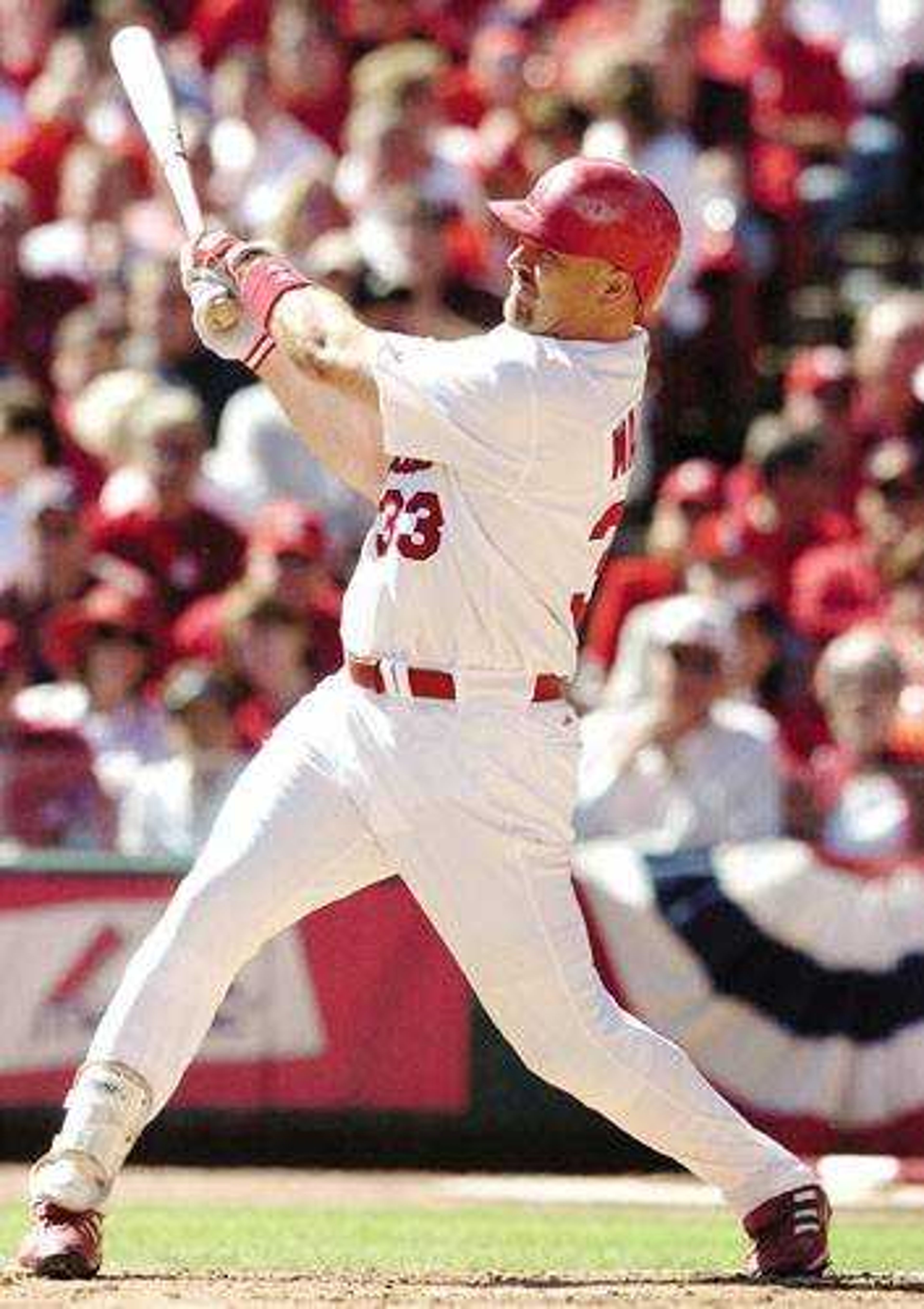 The Cardinals' Larry Walker followed through on his third-inning home run Tuesday against the Los Angeles Dodgers in Game 1 of the National League Division Series at Busch Stadium. Walker hit two of the Cardinals' five home runs.