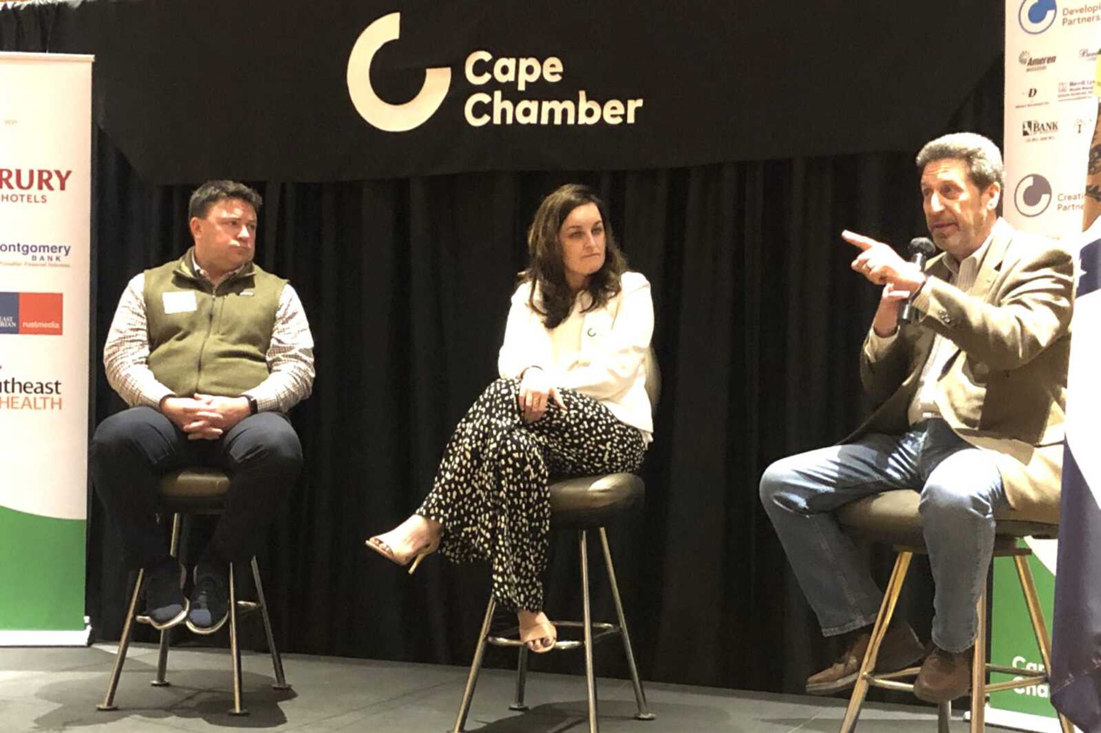 Cape Girardeau Area Chamber of Commerce president John Mehner, right, makes a point about economic development during a panel discussion Friday at the chamber's First Friday Coffee. With him are Jeff Maurer, president of Mayson Capital Partners, and Liz Haynes, executive director of Old Town Cape.