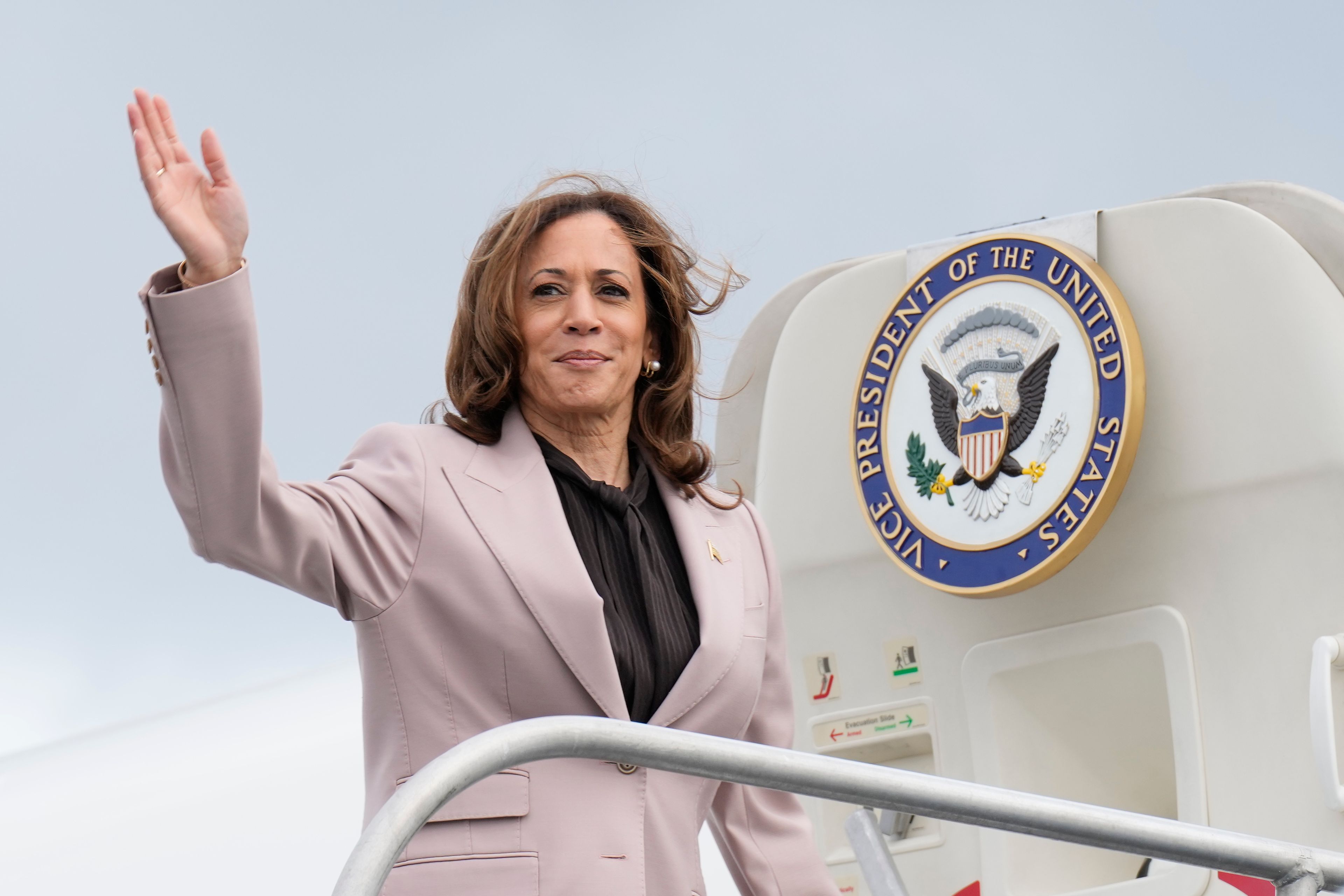 Democratic presidential nominee Vice President Kamala Harris waving before boarding Air Force Two, Monday, Sept. 9, 2024, near Philadelphia International Airport, in Philadelphia, Tuesday, Sept. 17, 2024. (AP Photo/Jacquelyn Martin)