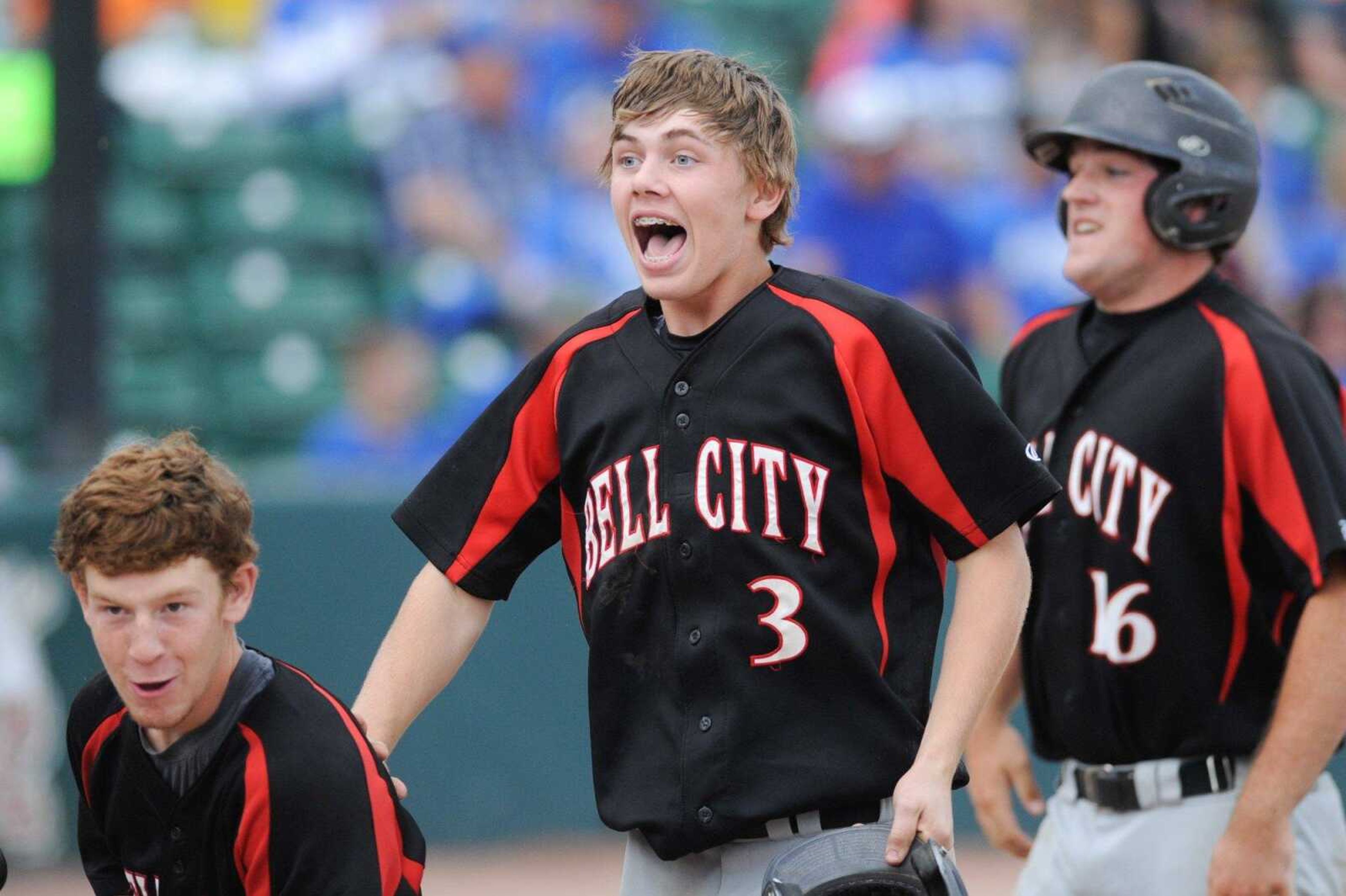 Bell City's Brandon Abner celebrates with his teammates after scoring in the sixth inning to win 11-1 by run-rule against Northwest in a Class 1 semifinal Tuesday, June 2, 2015 in O Fallon, Missouri. (Glenn Landberg)