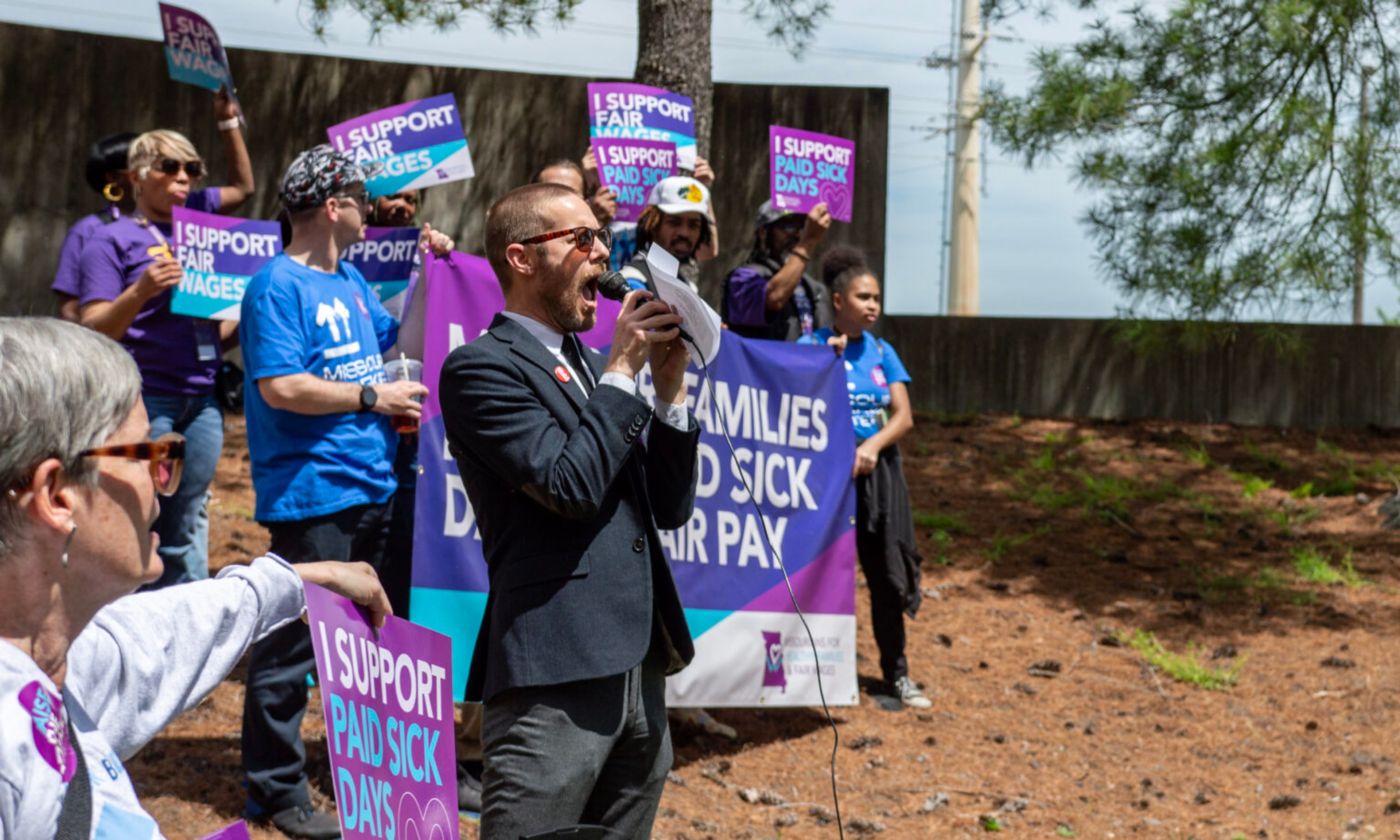 Missourians for Healthy Families and Fair Wages prepare for a news conference in May.
