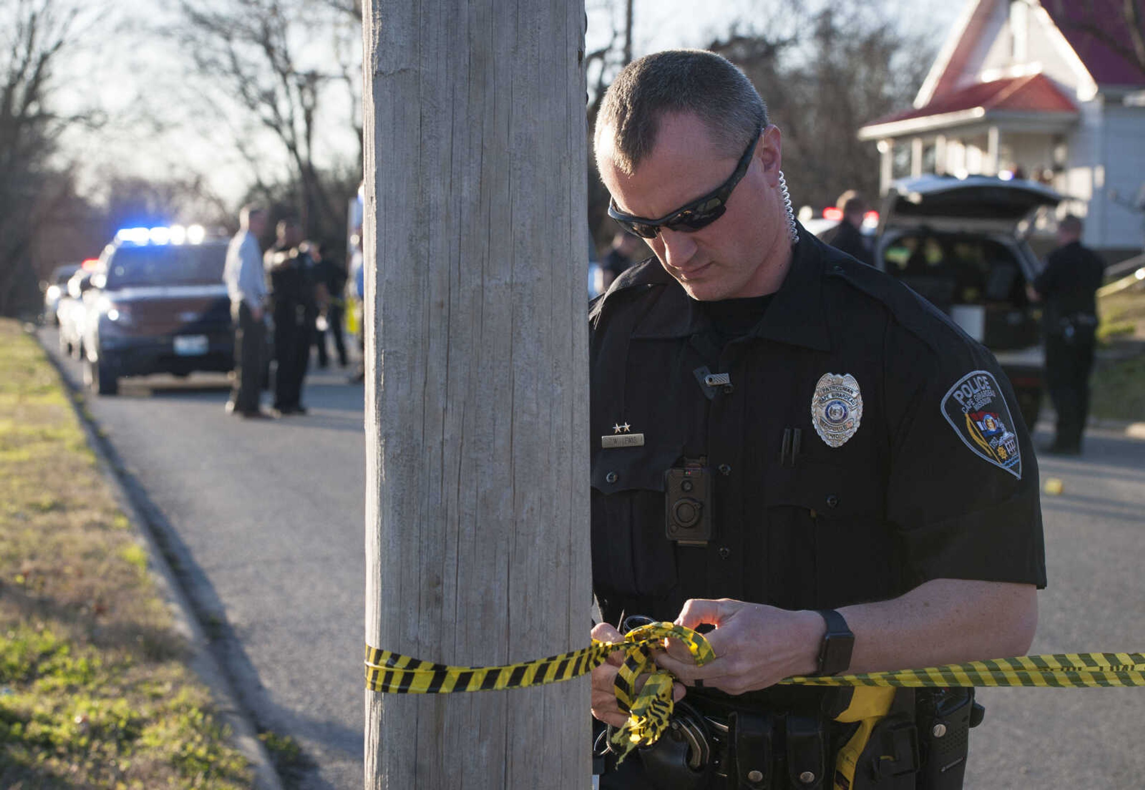 Cape Girardeau police officers secure the scene of a shooting at 918 College Street on Tuesday, March 3, 2020, in Cape Girardeau.