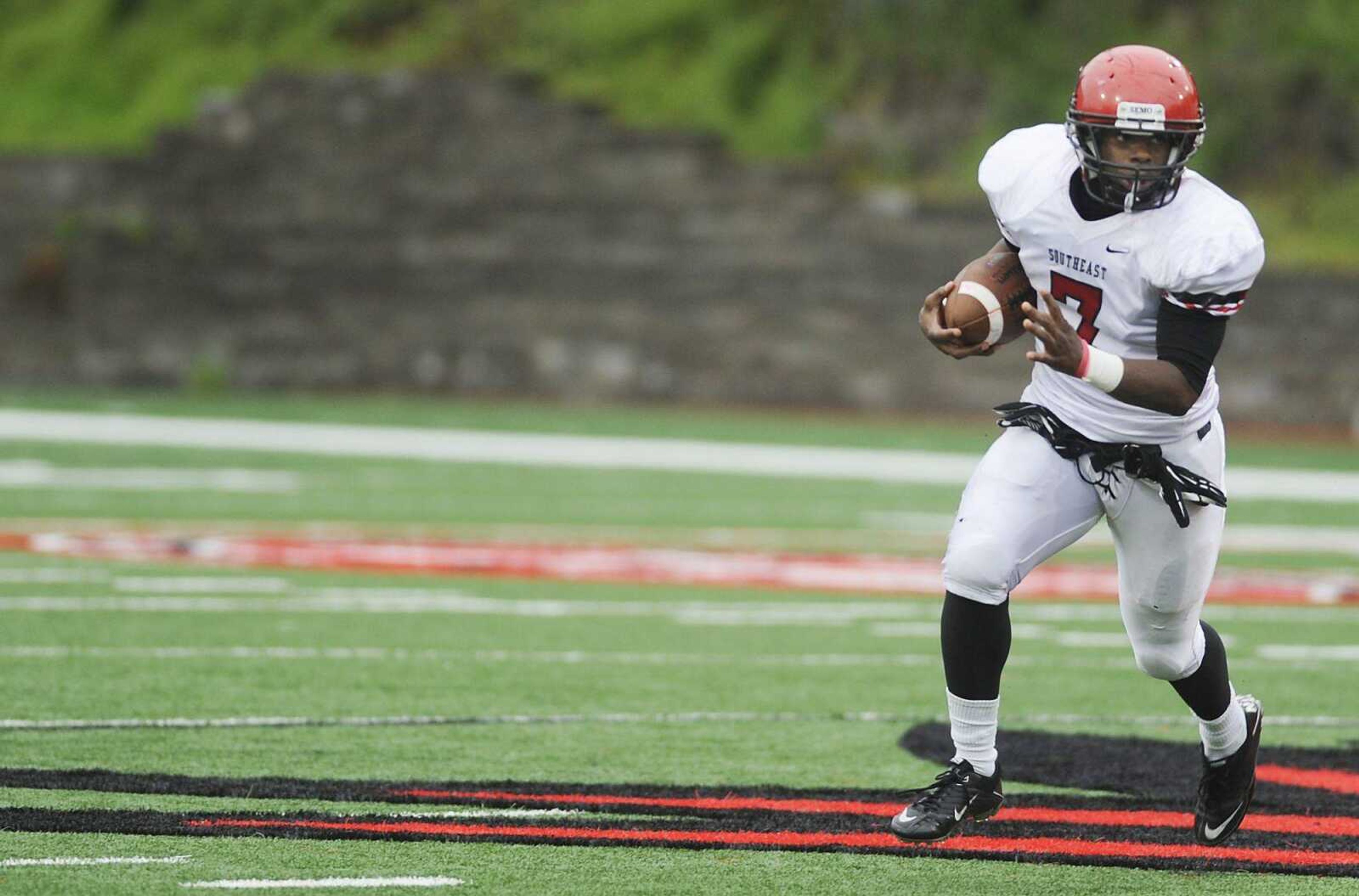 Southeast running back DeMichael Jackson looks for running yardage during Saturday&#8217;s spring game. (ADAM VOGLER)