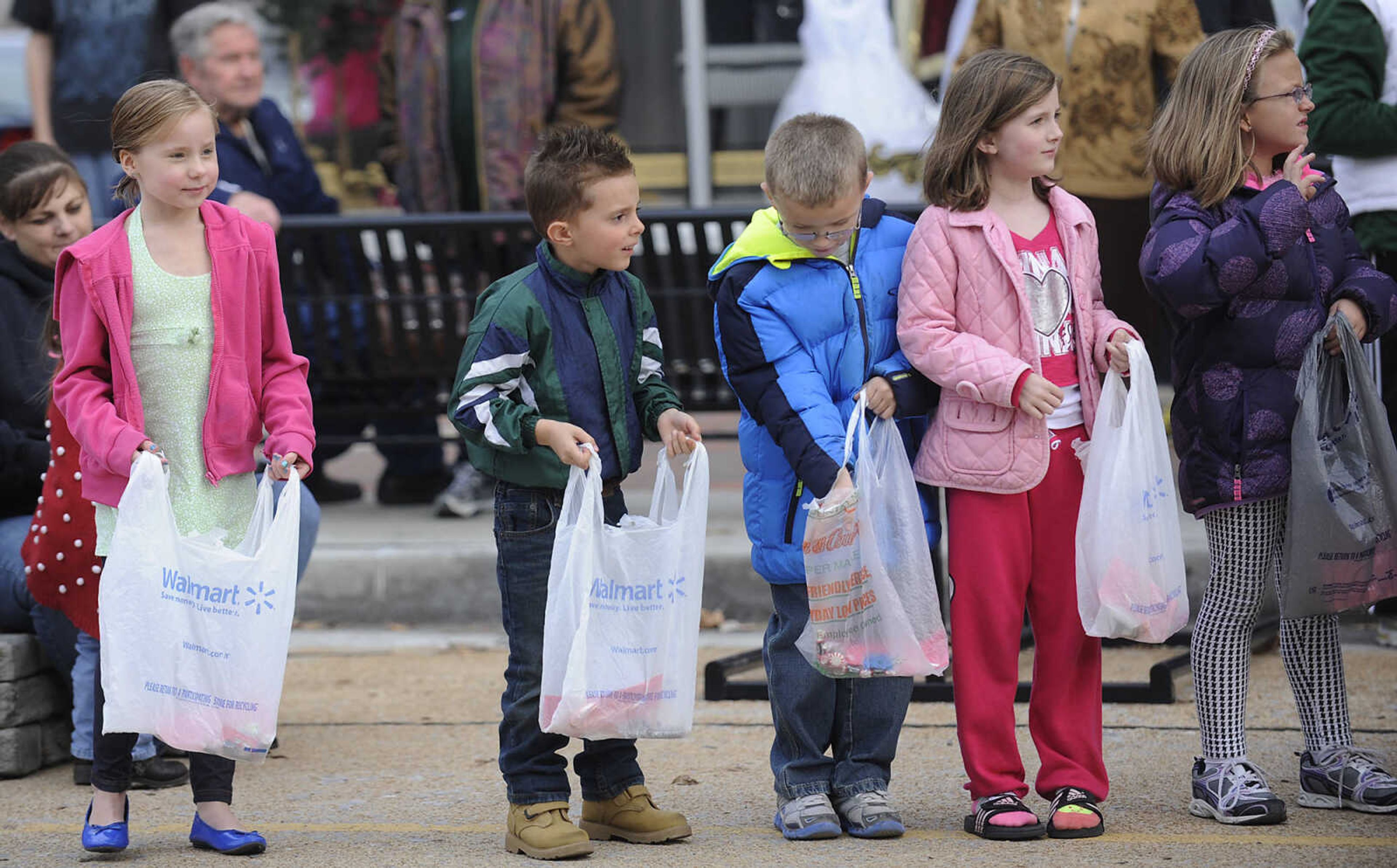 Children get ready to scramble for candy during the Jackson Jaycee Foundation Christmas Parade Saturday, Dec. 1, in Jackson.