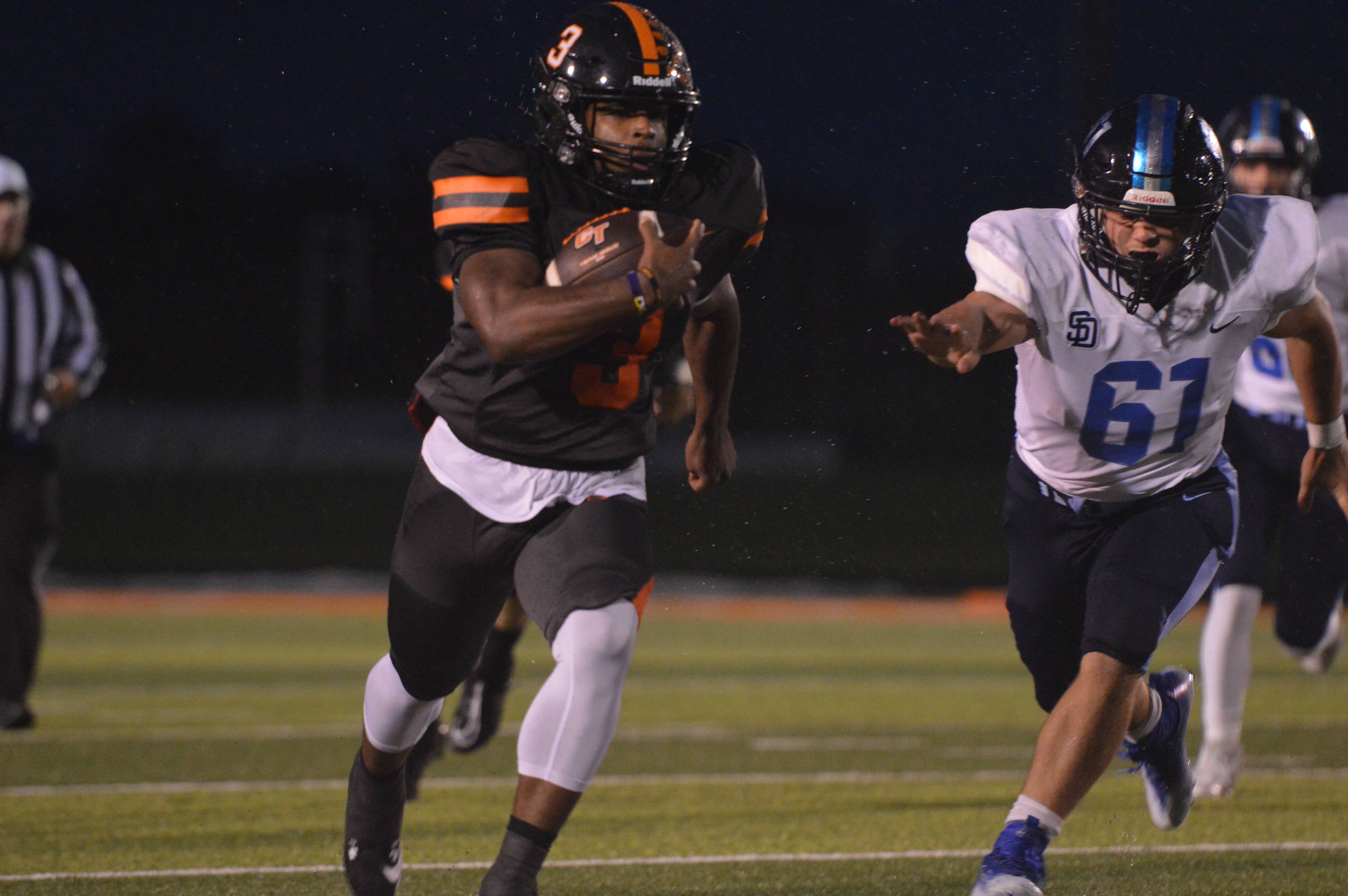 Cape Central senior Zai'Aire Thomas sprints down the near sideline for a 62-yard touchdown run on the first play of the game in a 47-0 shutout victory over St. Dominic on Friday, Sept. 27. Thomas had 280 rushing yards and four touchdowns in the first half alone as the Tigers improved to 5-0 on the season.