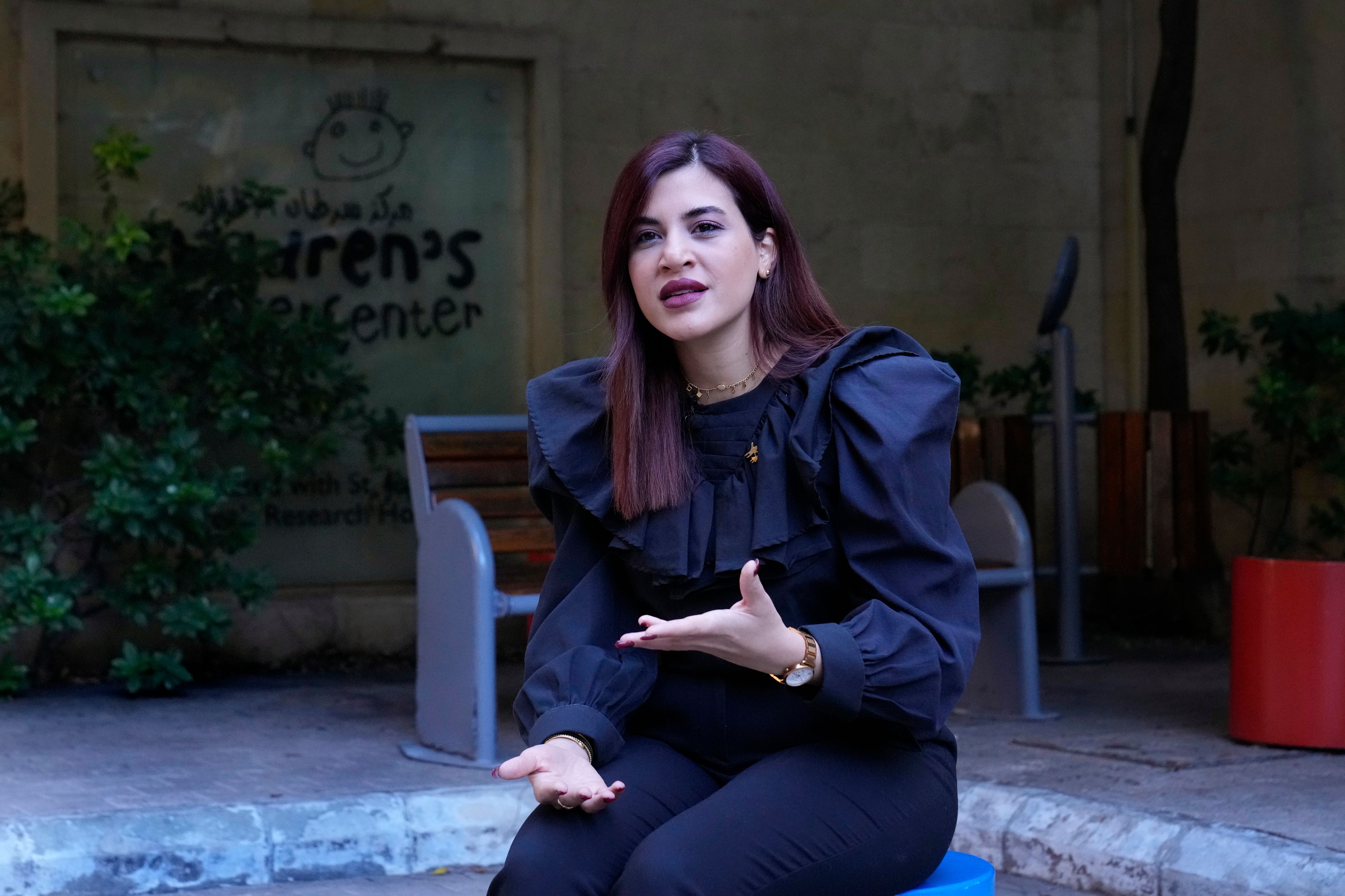 Zeina Al Chami, events and fundraising executive at the Children's Cancer Center of Lebanon, speaks during an interview with the Associated Press, in Beirut, Lebanon, Friday, Nov. 15, 2024. (AP Photo/Hussein Malla)