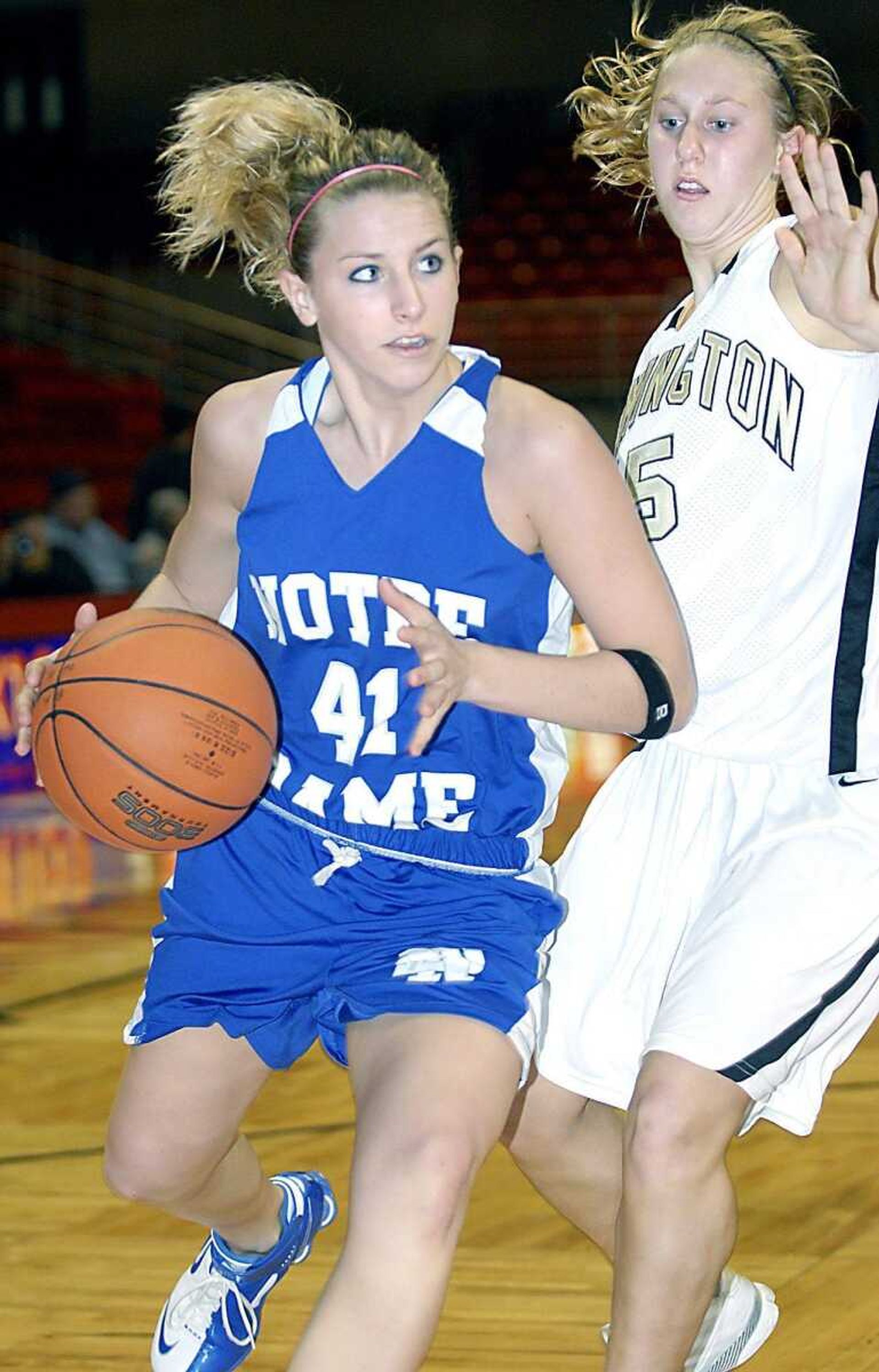 Notre Dame freshman Allyson Bradshaw looked for room to move around Farmington defender Taylor Jensen Friday night, December 21, 2007, during the championship game of the St. Francis Medical Center Holiday Classic at the Show Me Center. (Kit Doyle)