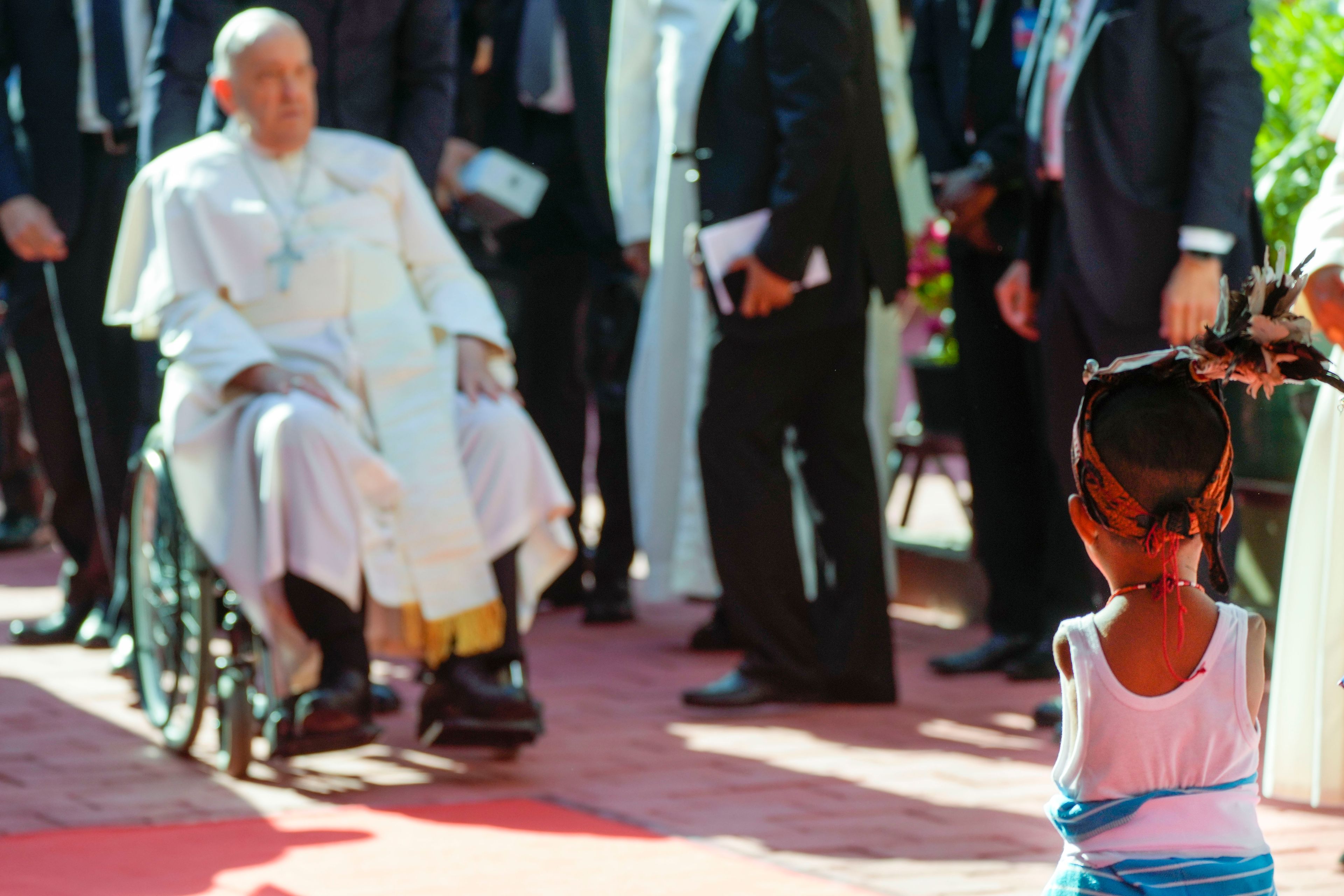 Pope Francis arrives at the 'Irmas ALMA' (Sisters of the Association of Lay Missionaries) School for Children with Disabilities in Dili, East Timor, Tuesday, Sept. 10, 2024. Pope Francis has indirectly acknowledged the abuse scandal in East Timor involving its Nobel Peace Prize-winning independence hero Bishop Carlos Filipe Ximenes Belo. (AP Photo/Gregorio Borgia)