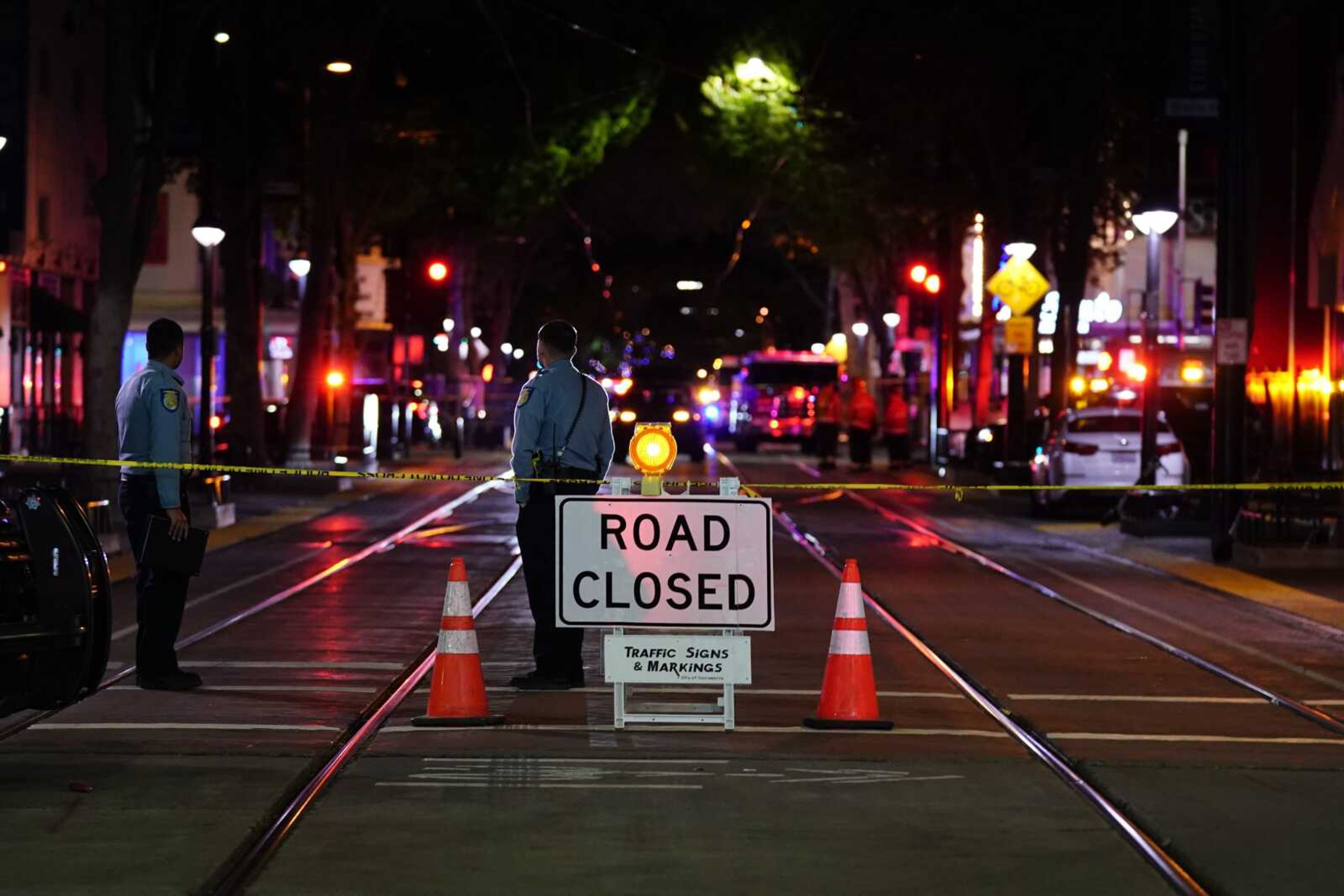 A roadblock is set a block away from the scene of an apparent mass shooting Sunday in Sacramento, California.