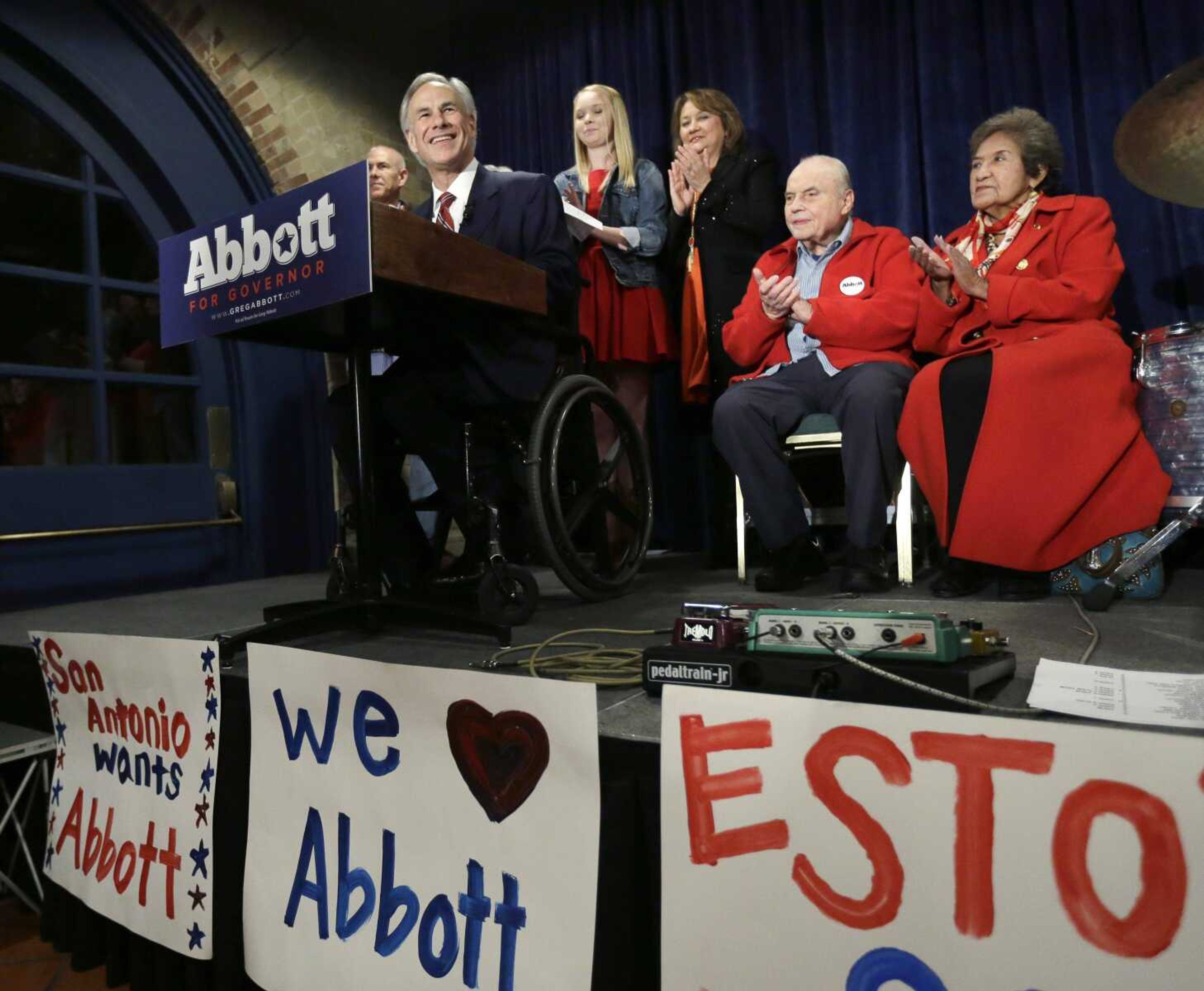 Texas Republican gubernatorial candidate Attorney General Greg Abbott, left, talks to supporters in San Antonio on March 4. Abbott is due, as attorney general, to issue a legal decision on whether the public can know where Texas gets its execution drugs. (Eric Gay ~ Associated Press)