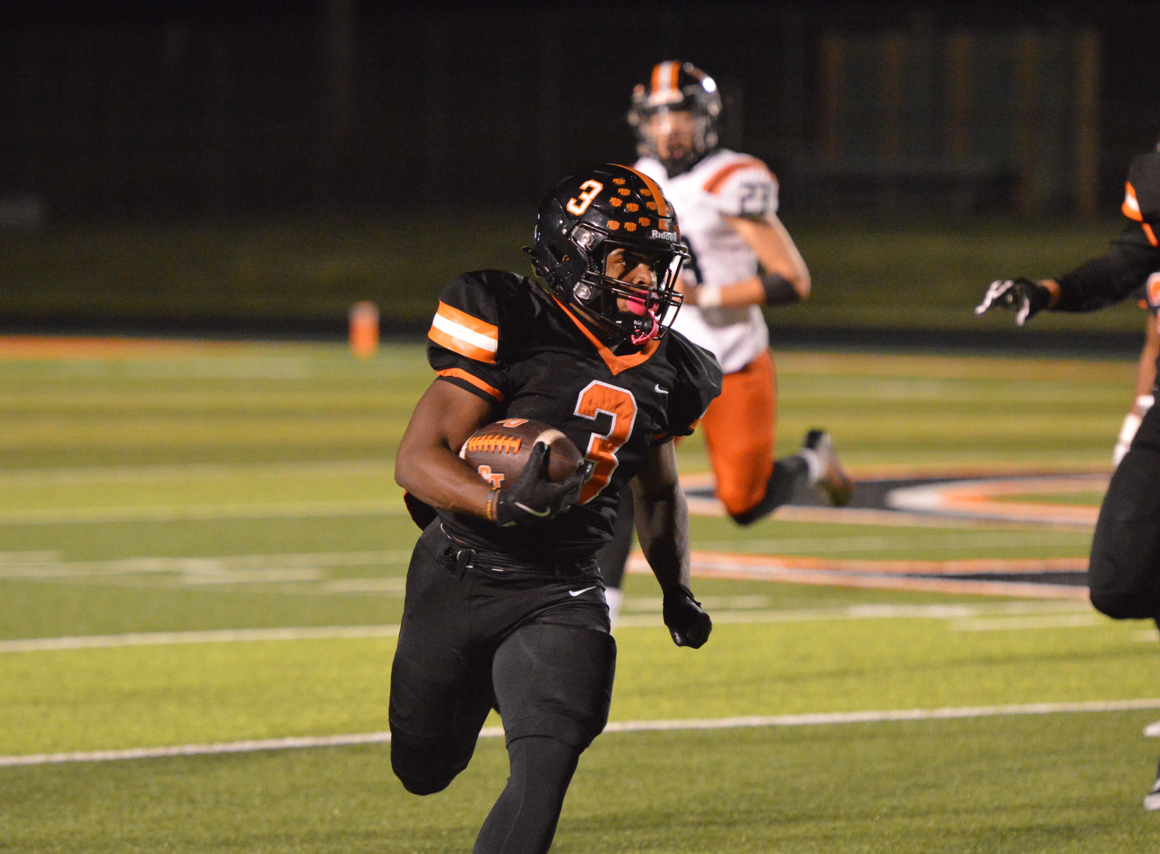 Cape Central senior Zai'Aire Thomas coasts down the sideline against the Webster Groves defense in the Class 5 District 1 quarterfinals on Friday, Nov. 1. The Tigers defeated the road Statesmen 42-7.