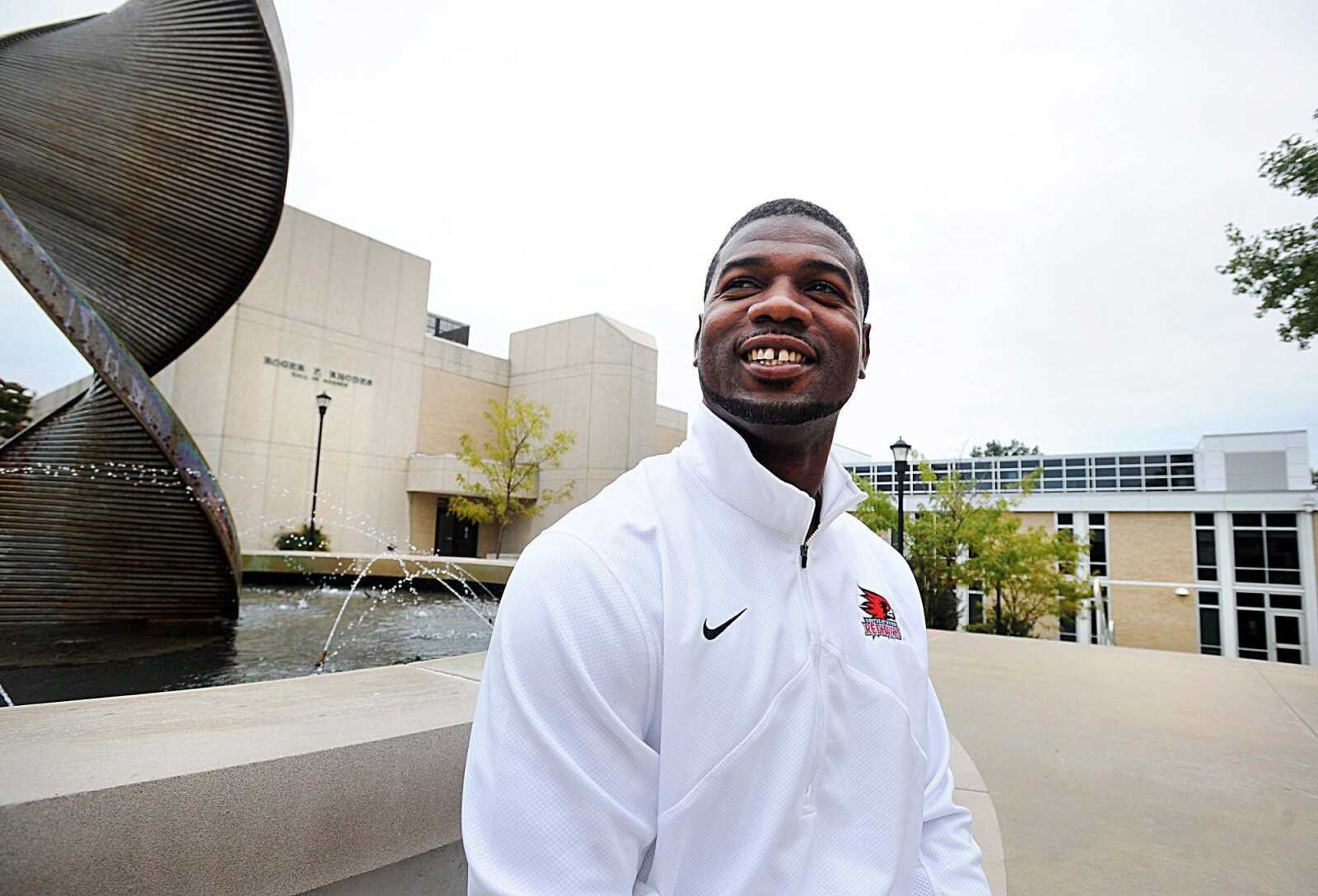 Former Southeast Missouri State and NFL football player, Willie Ponder, has returned to Southeast to continue his education and help coach the football team. Ponder stands outside Rhodes Hall of Science last week. (Laura Simon)