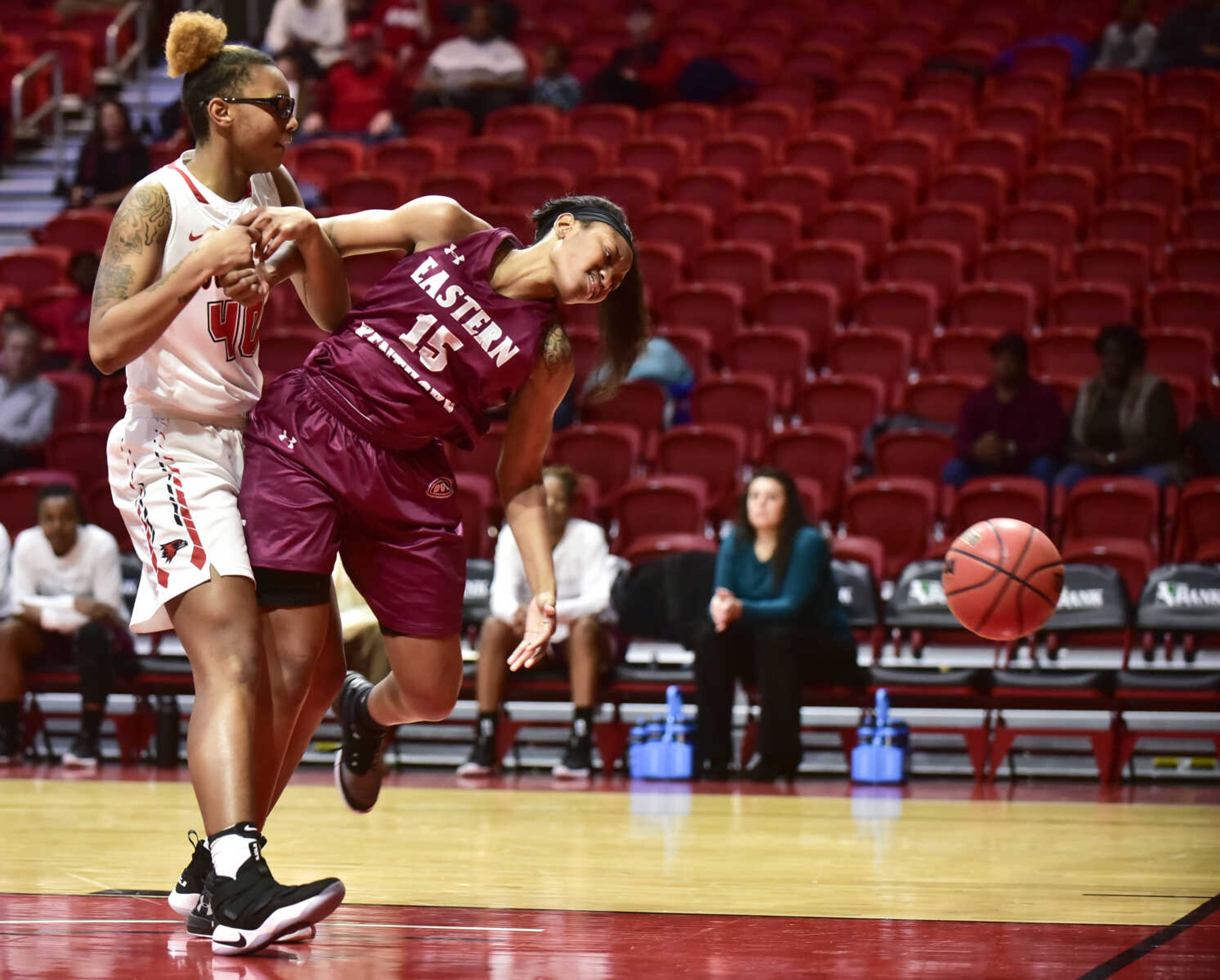 Southeast Missouri State's LaTrese Saine gets tangled up with Eastern Kentucky's Bria Bass during a jump ball in a game Jan. 13, 2018, at the Show Me Center in Cape Girardeau.