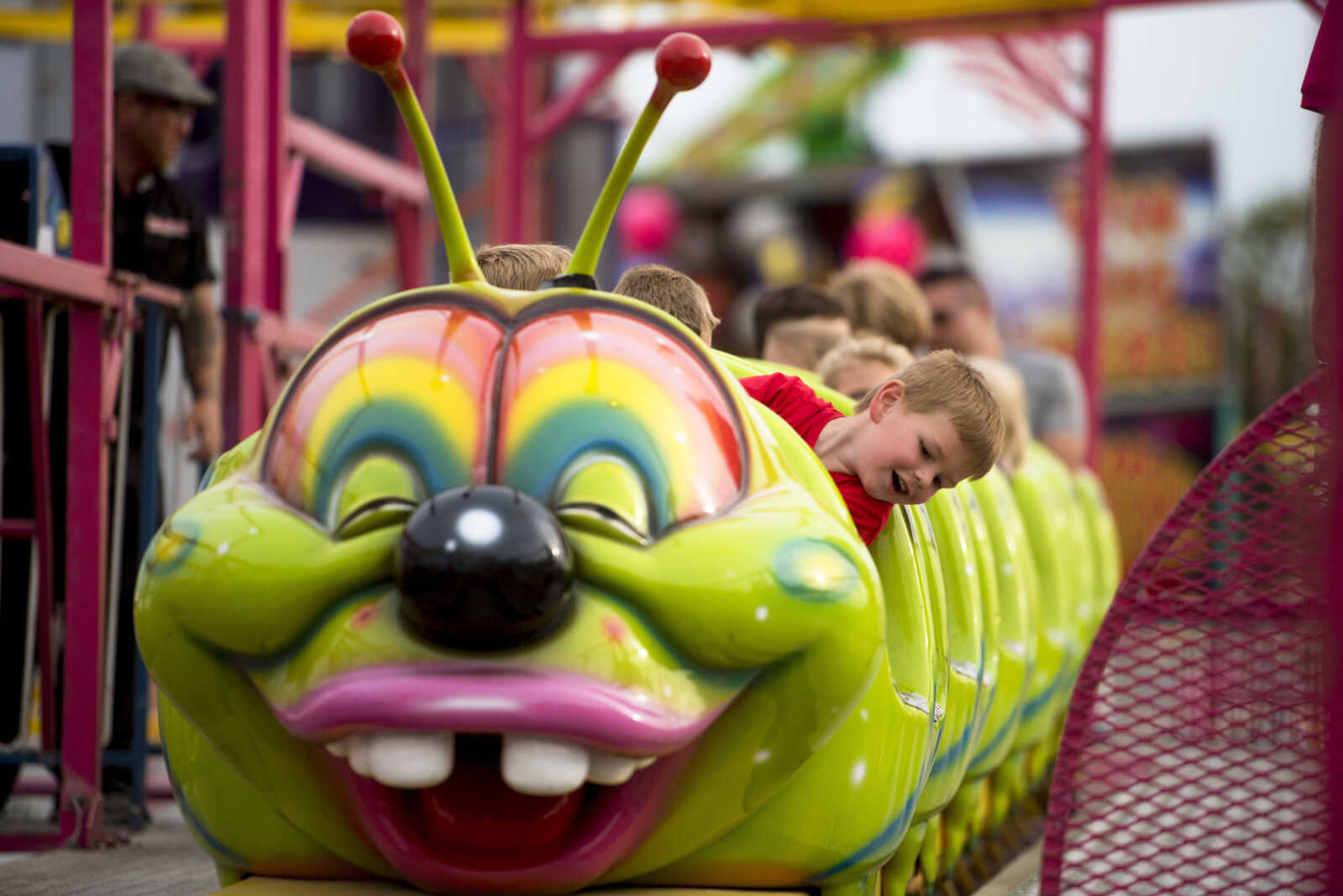 Paxton Huffman, 5, looks down the tracks while on a ride at the SEMO District Fair on September 11, 2017, in Cape Girardeau.