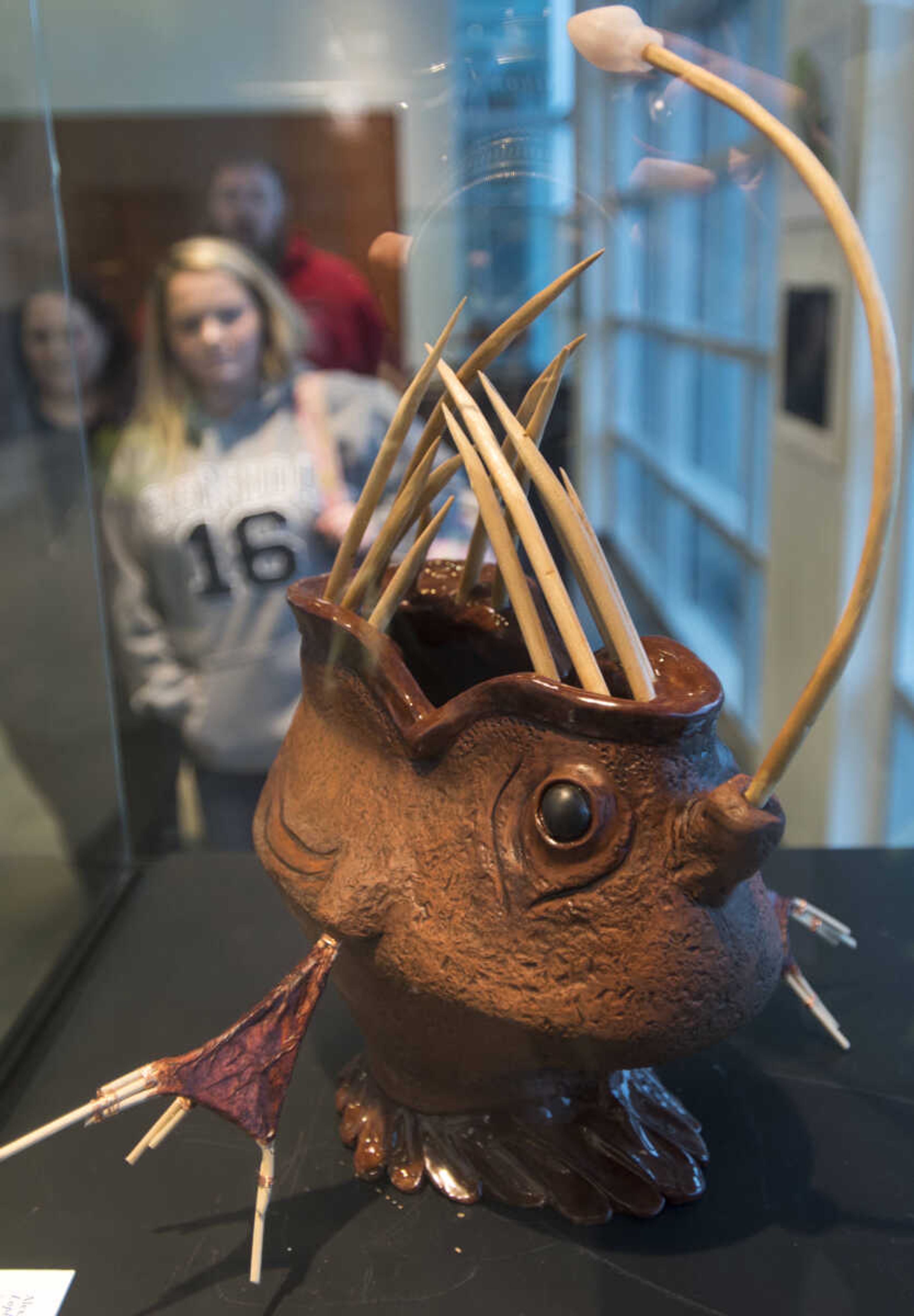 Guests view Cape Central student Alexis Richardson's sculpture "Lophiiformes" during a high school art exhibition Sunday, Feb. 18, 2018, at Crisp Museum in Cape Girardeau.