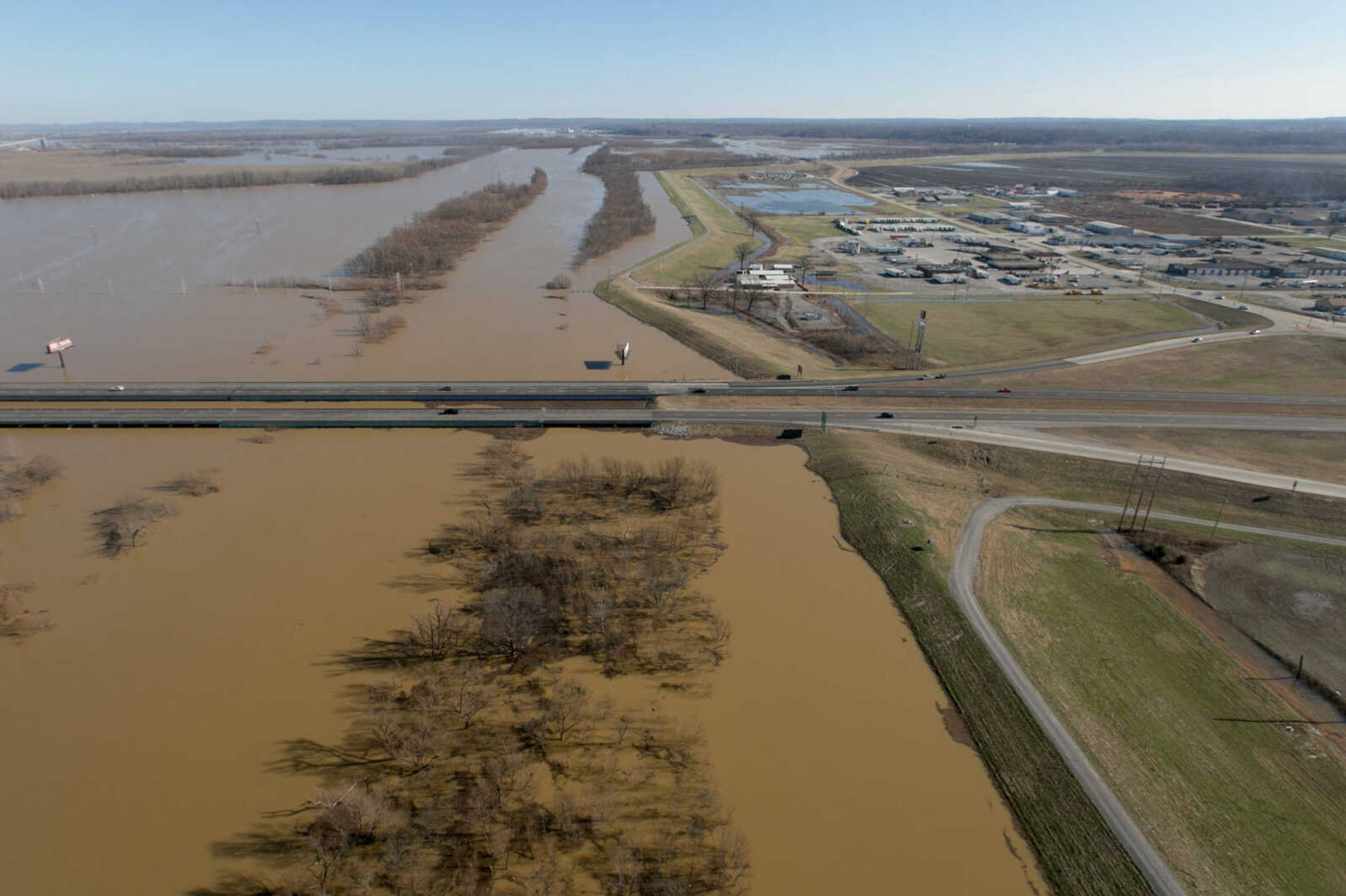 GLENN LANDBERG ~ glandberg@semissourian.com

Floodwater from the Diversion Channel spreads across the horizon near Cape Girardeau, Saturday, Jan. 2, 2016.