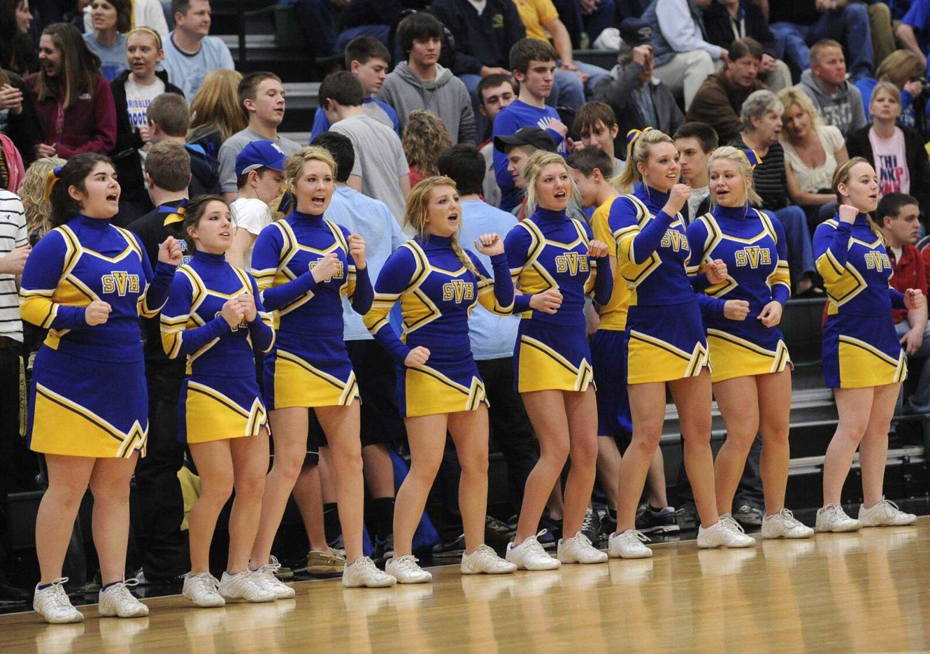 St. Vincent's cheerleaders support their team near the end of the Class 2 District 4 title game Friday in Perryville, Mo. (Fred Lynch)