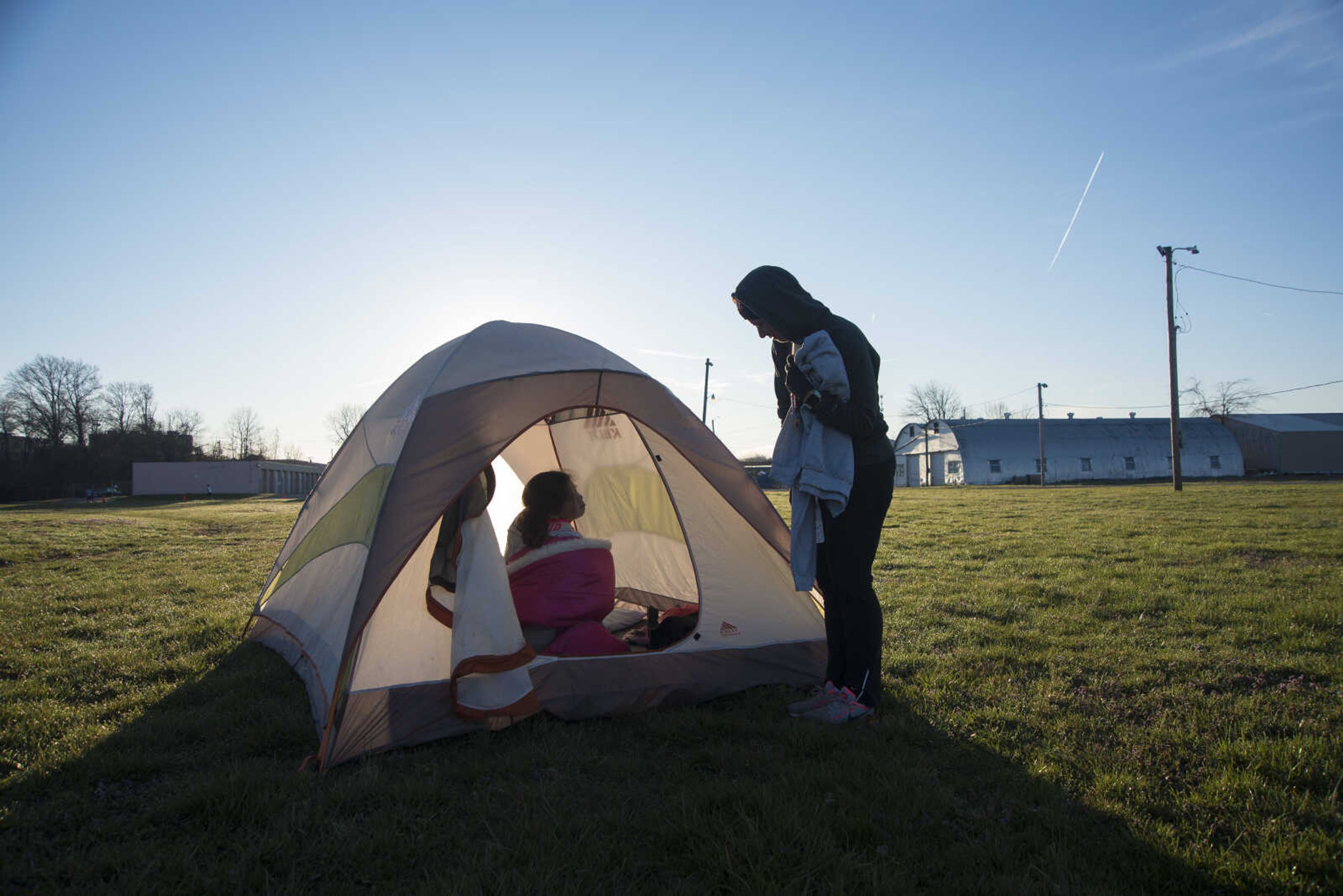 Lynn Pollihan wakes up her daughter Madison Pollihan, 9, before continuing to participate for the 8th annual Howard Aslinger Endurance Run on Friday, March 17, 2017 in Cape Girardeau. The event raises money for the Howard L. Aslinger Memorial Scholarship where runners will keep running until they can't anymore with the event starting at 7 p.m. Friday night going for 24 hours until Saturday night.