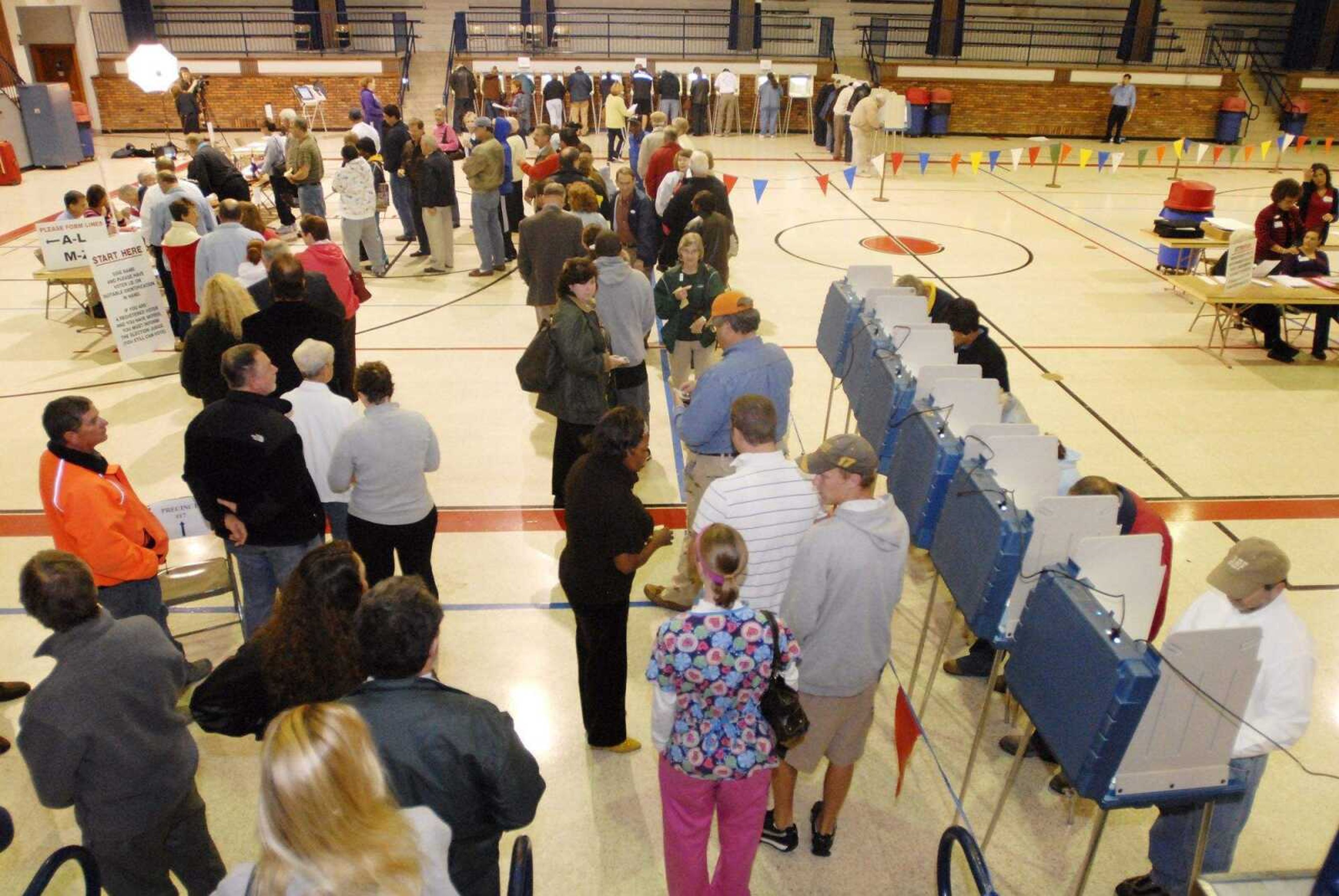 CHUCK WU ~ cwu@semissourian.com
People wait in line to vote Tuesday at the Arena Building in the morning before work.