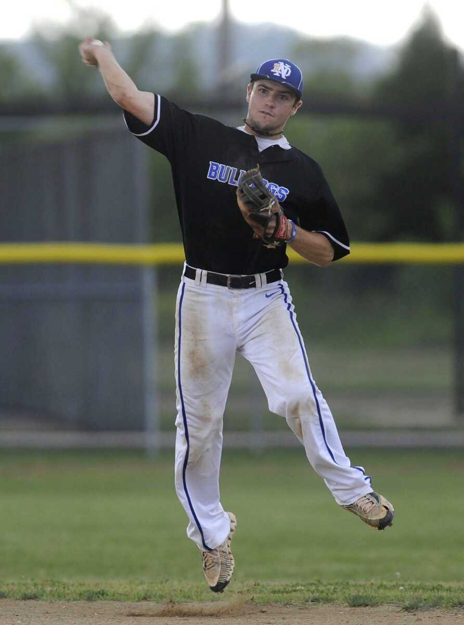 Notre Dame shortstop Griffin Siebert throws to first base after fielding a grounder during the fifth inning.