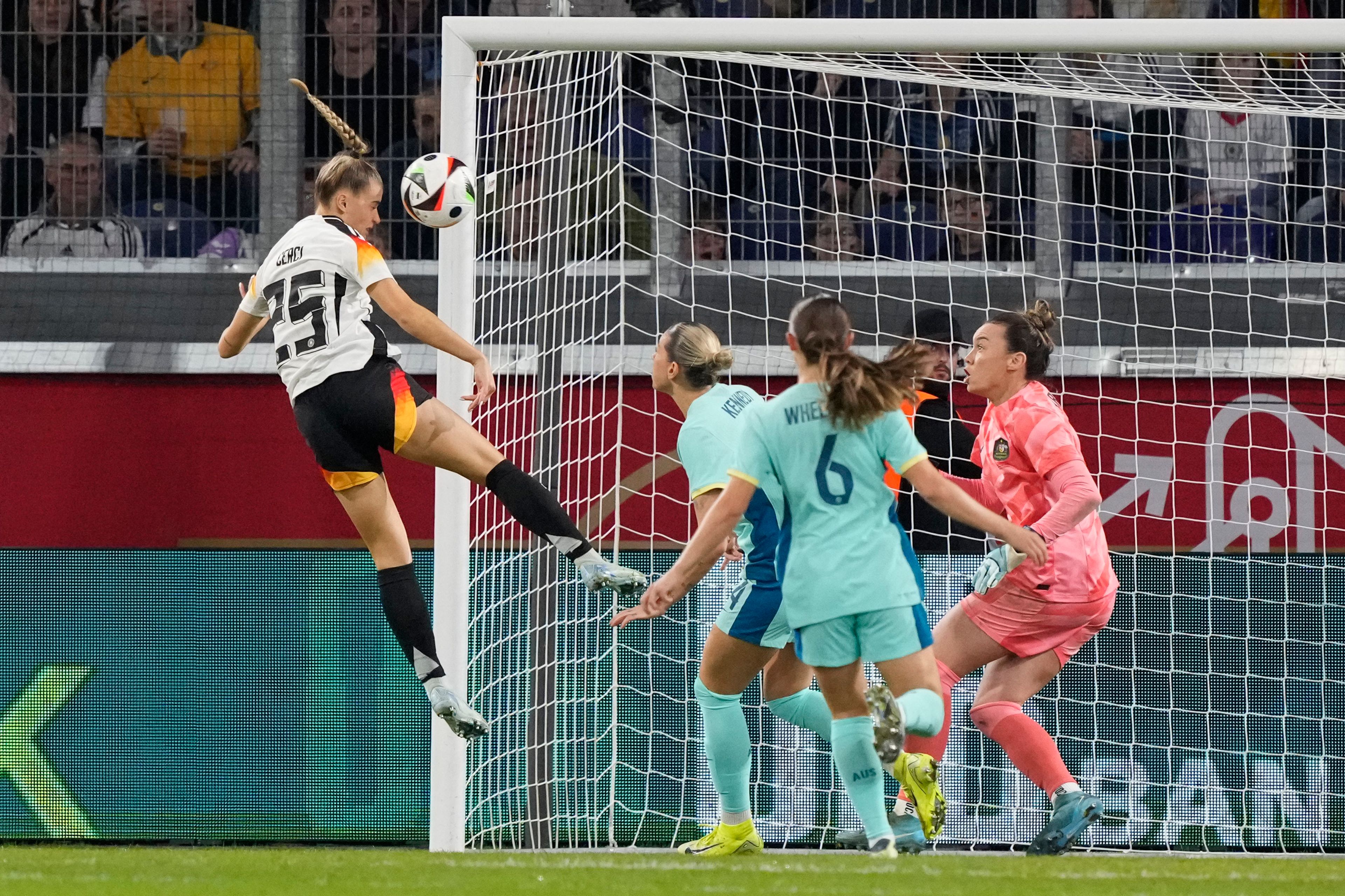 Germany's Selina Cerci scores the opening goal against Australia's goalkeeper Mackenzie Arnold during the international women's friendly soccer match between Germany and Australia in Duisburg, Germany, Monday, Oct. 28, 2024. (AP Photo/Martin Meissner)